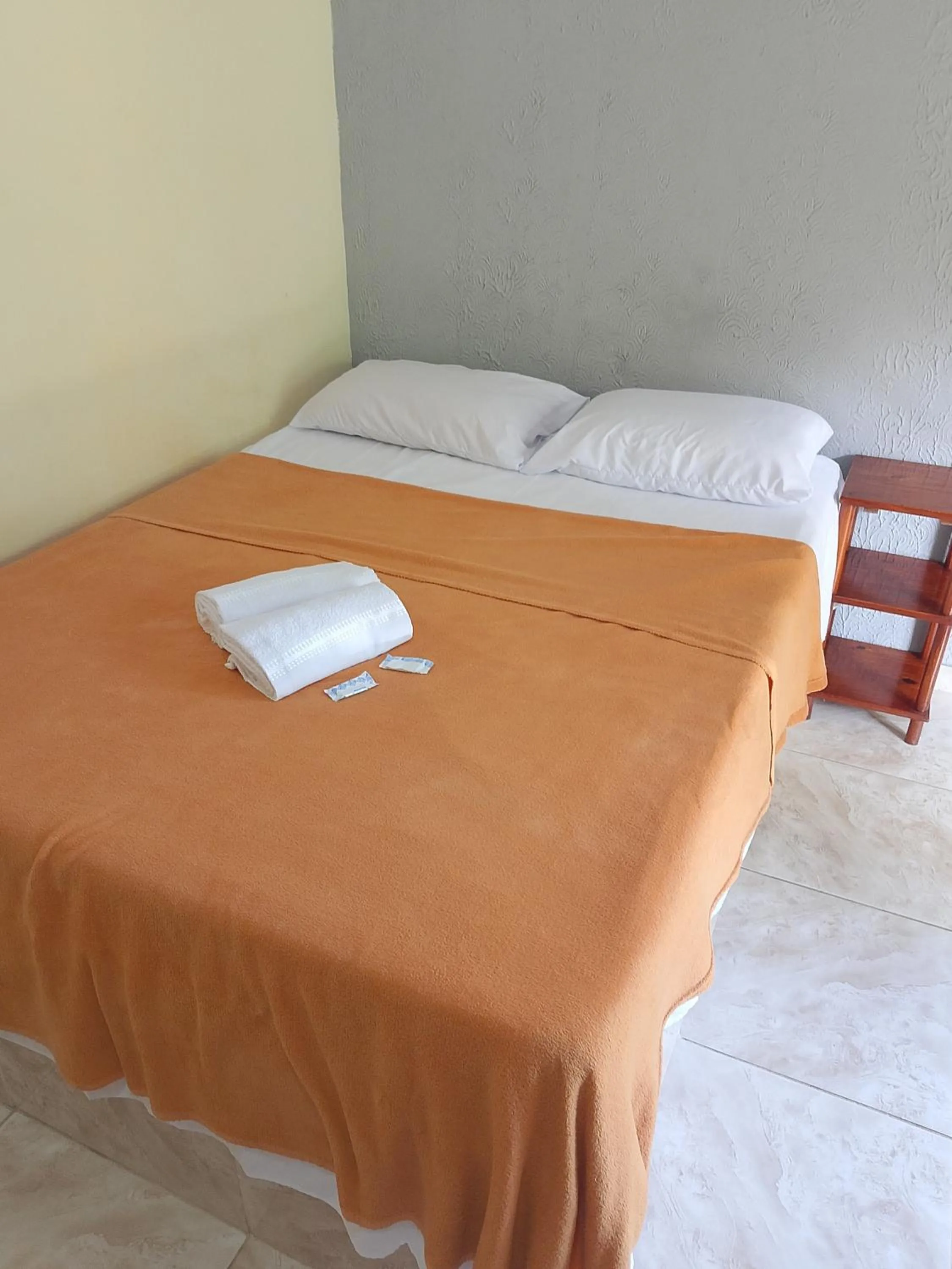 Bed in Pousada Pimenta Rosa