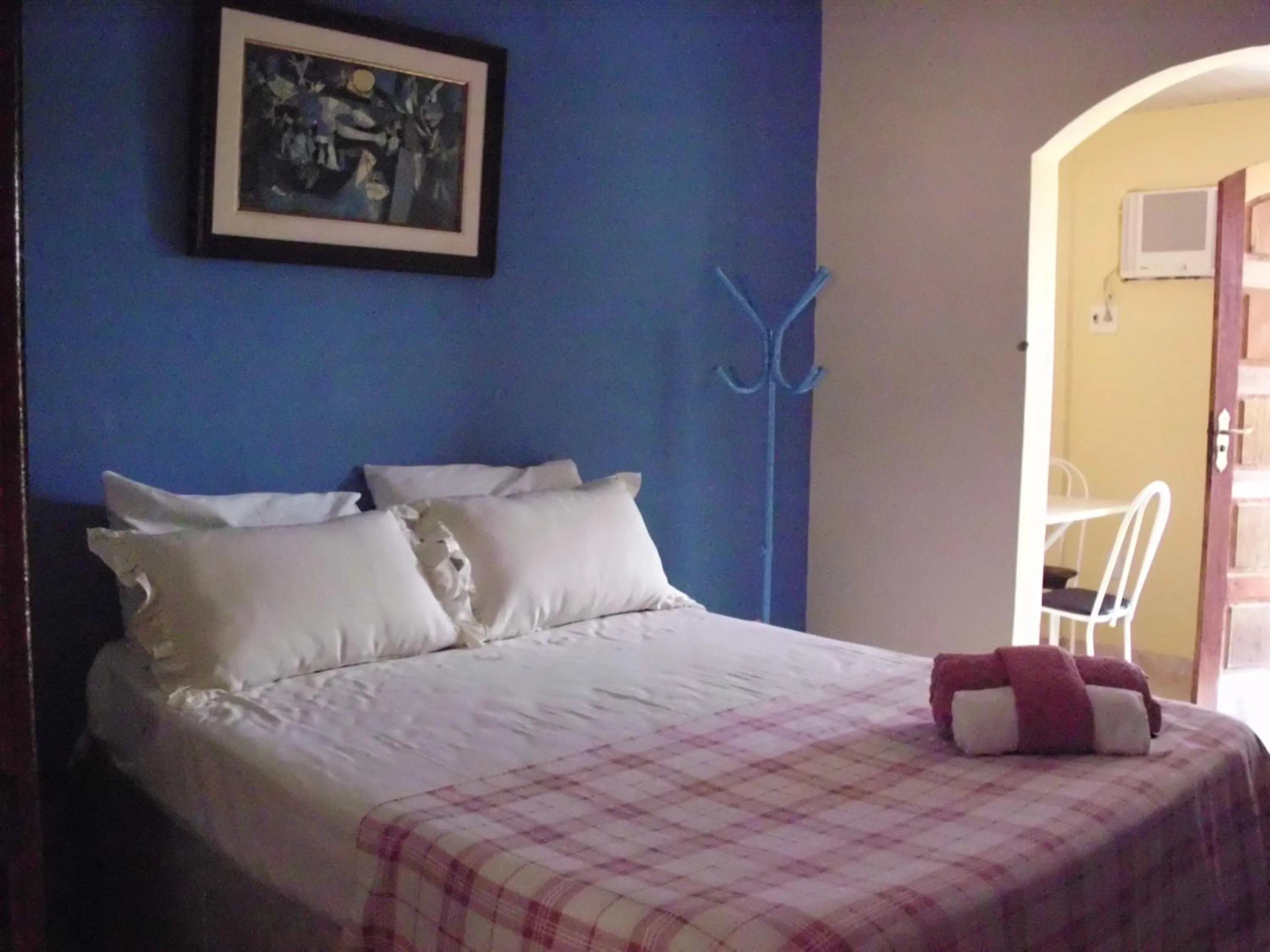 Bed in Pousada Pimenta Rosa