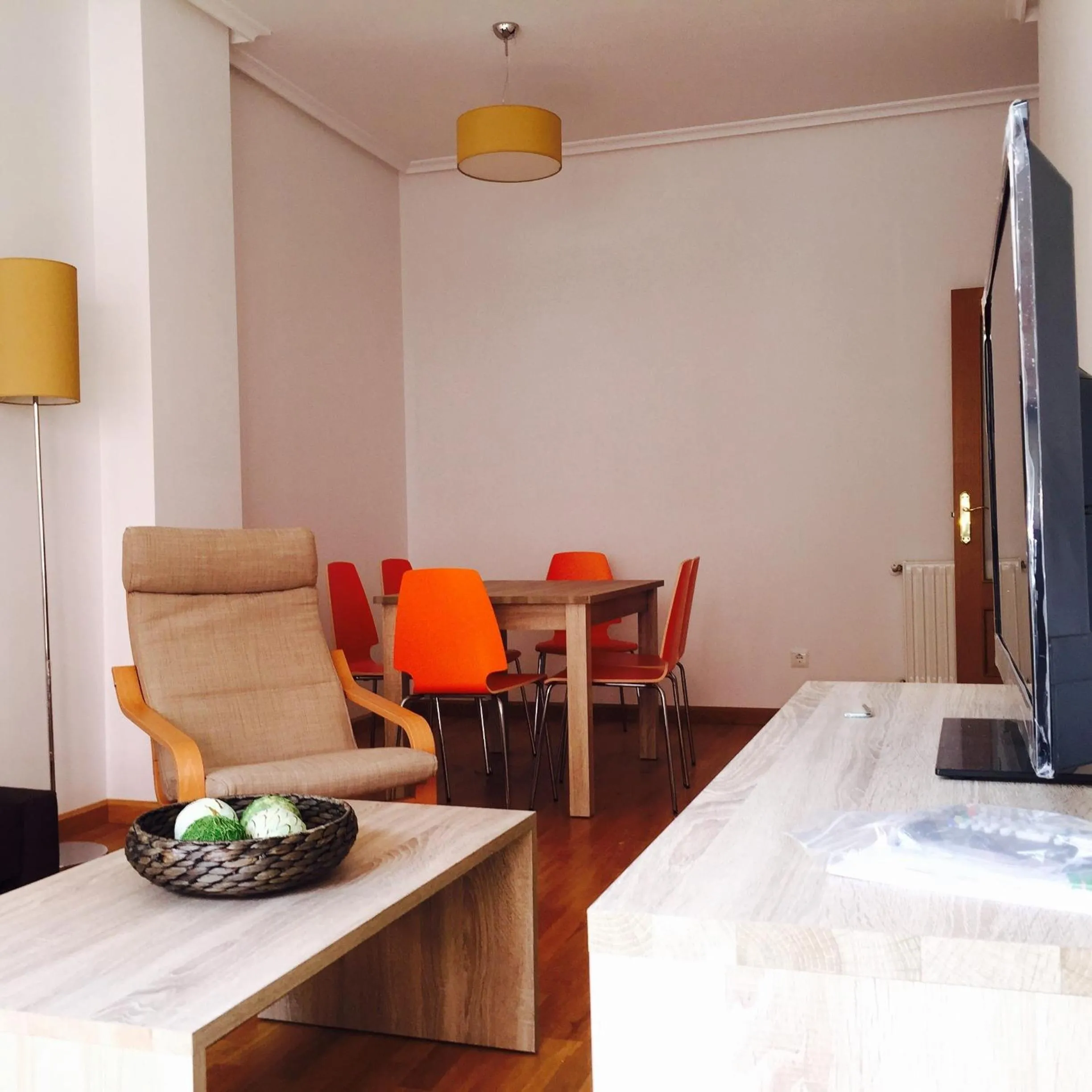 Living room, Bed in Apartamentos El Caxigu
