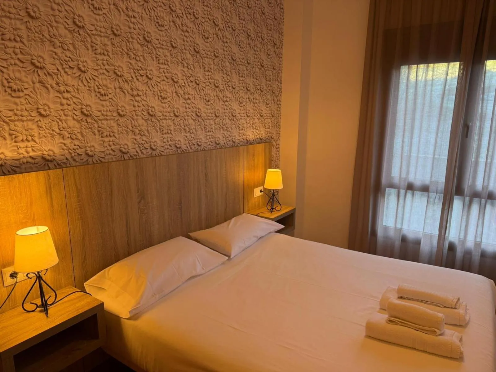 Bedroom, Bed in Apartamentos El Caxigu
