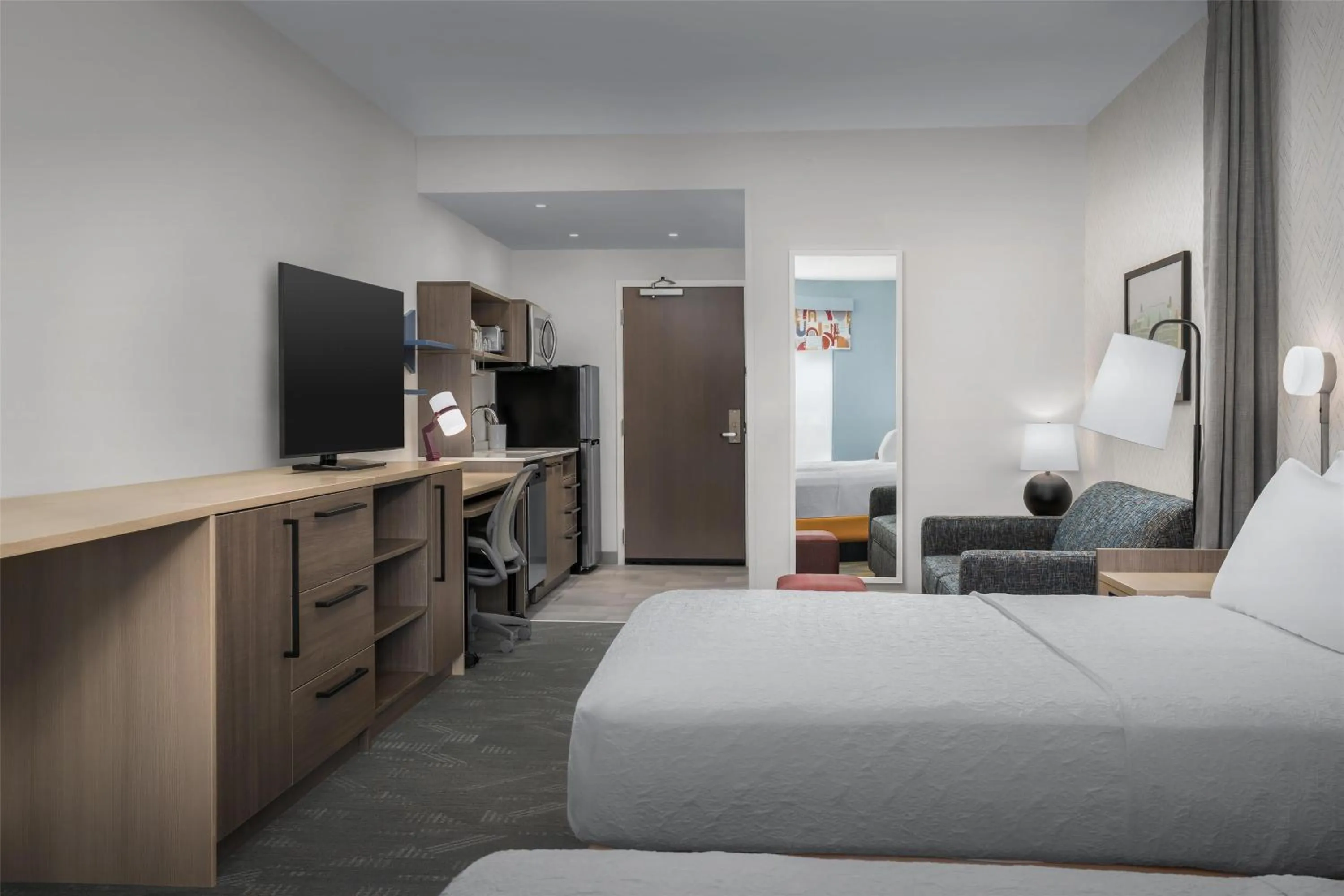 Living room, Bed in Home2 Suites By Hilton Tooele