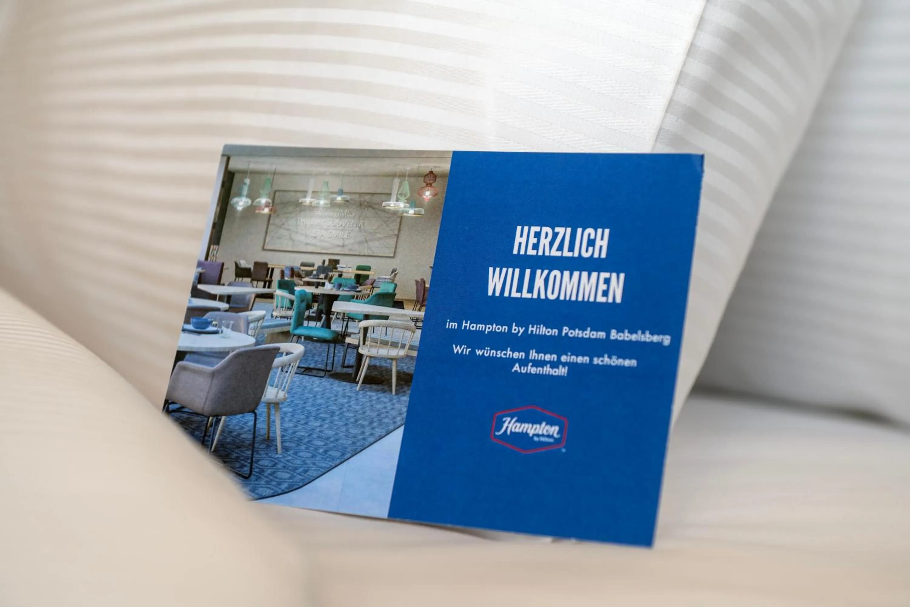 Property logo or sign in Hampton By Hilton Potsdam Babelsberg