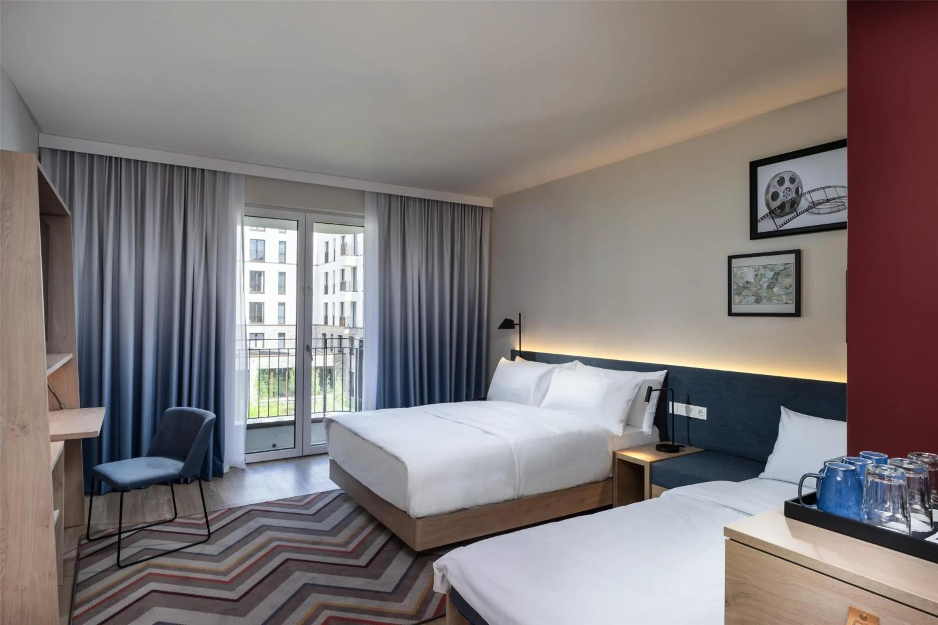 Living room, Bed in Hampton By Hilton Potsdam Babelsberg