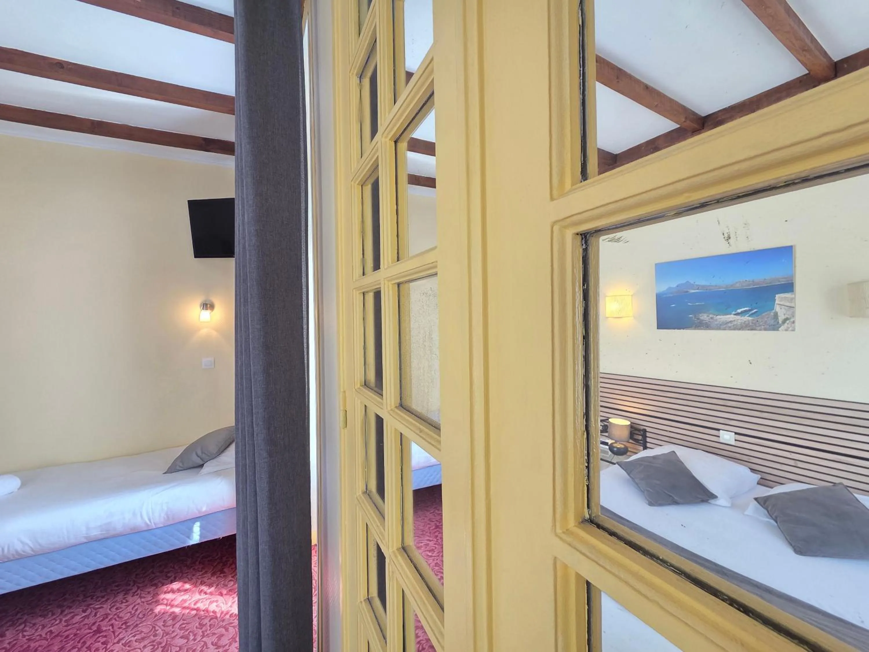 Bed in Hotel Magdeleine