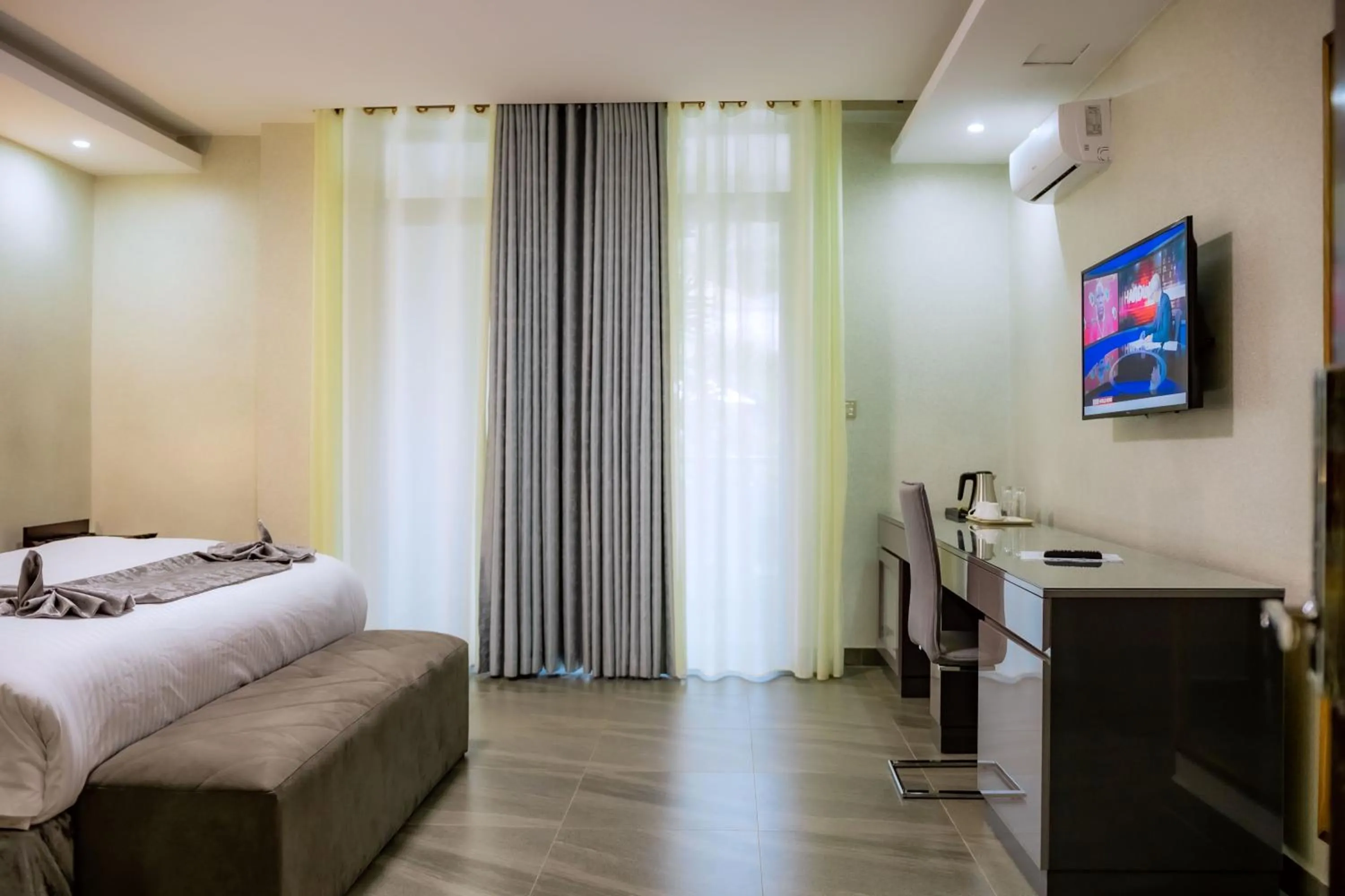 Bed in Grazia Apartment Hotel