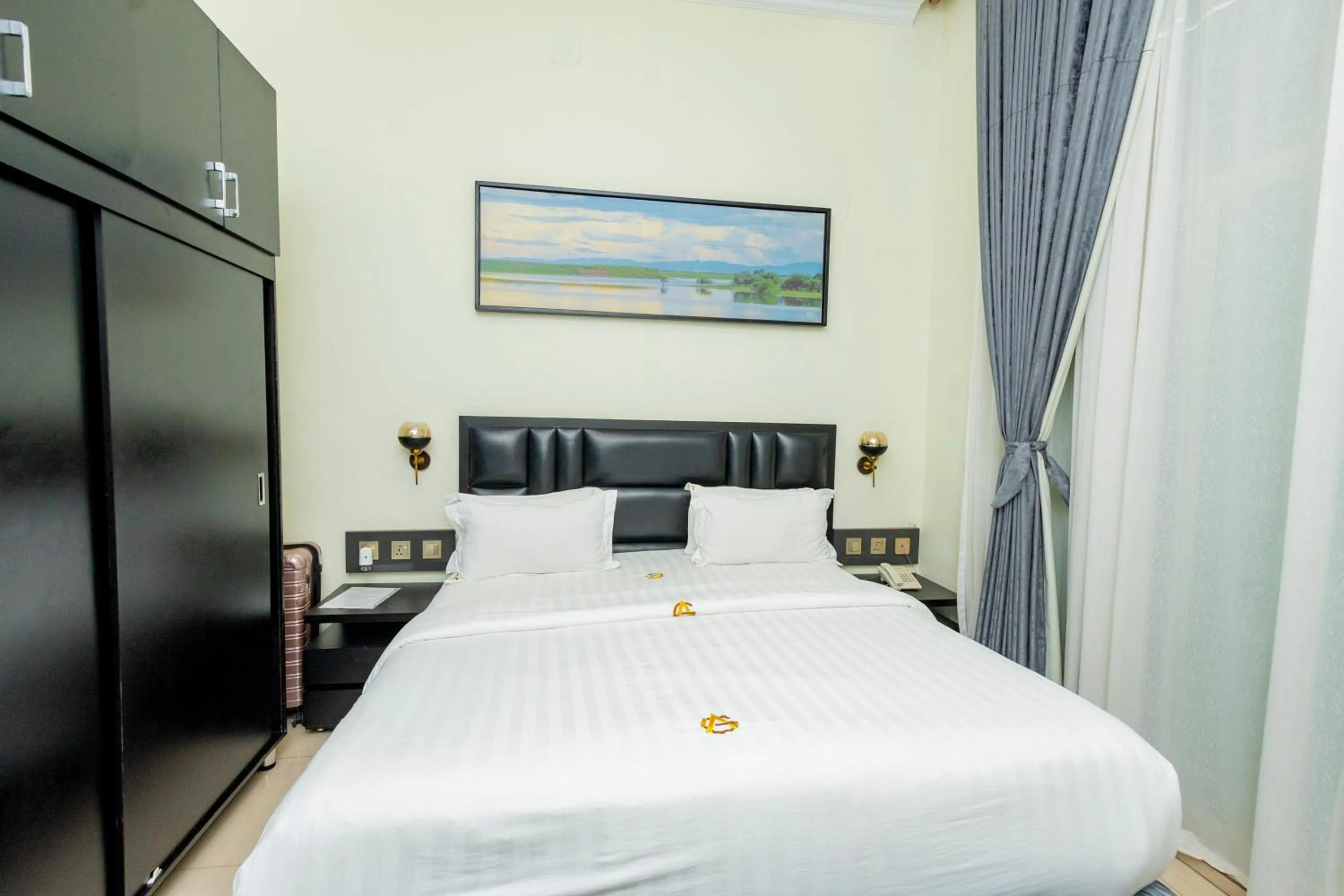 Bed in Grazia Apartment Hotel