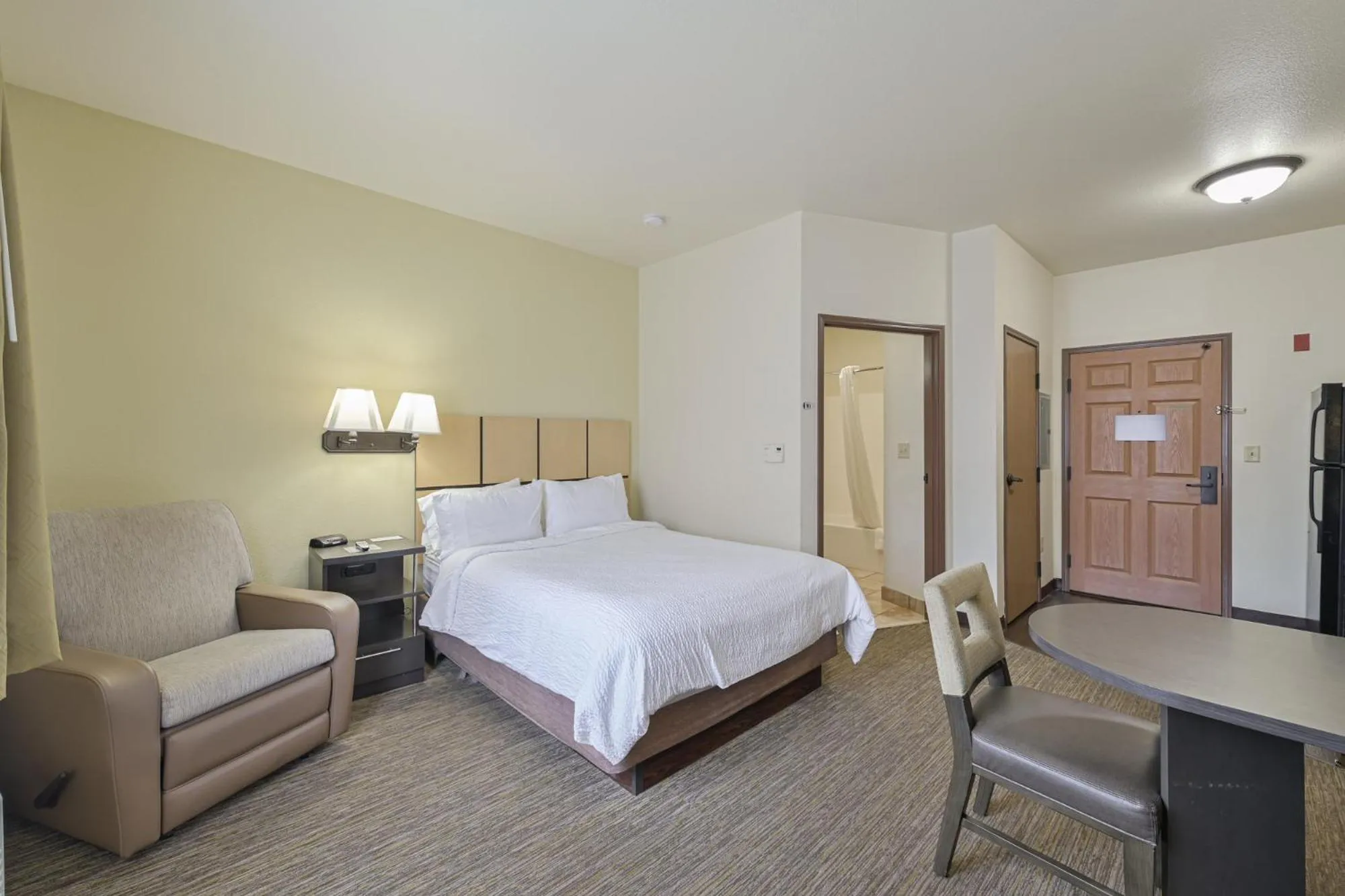 Bed in Affordable Suites of America Tulsa