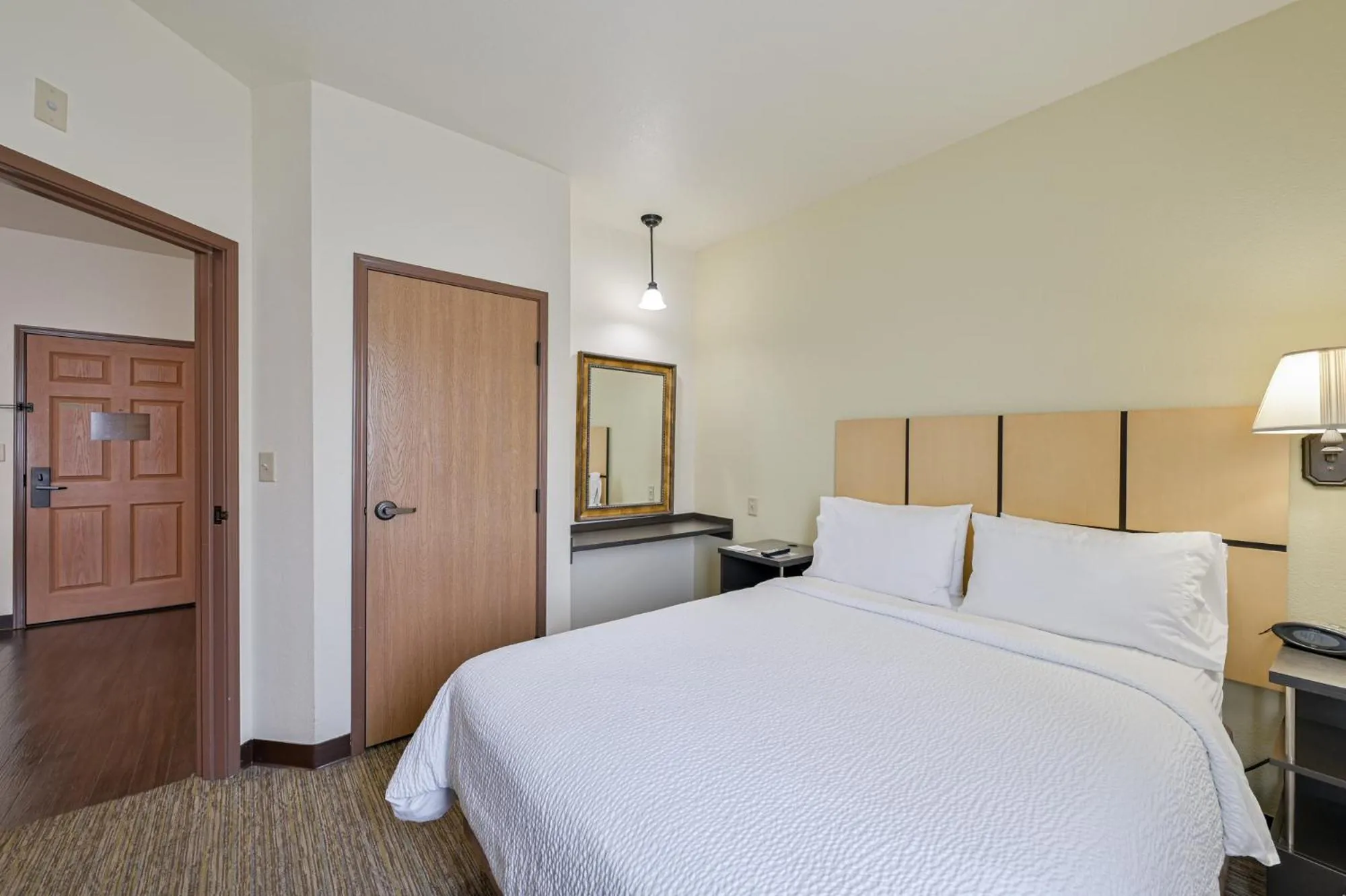 Bed in Affordable Suites of America Tulsa