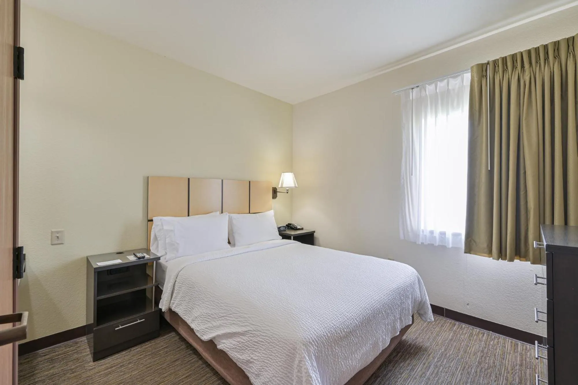 Bed in Affordable Suites of America Tulsa
