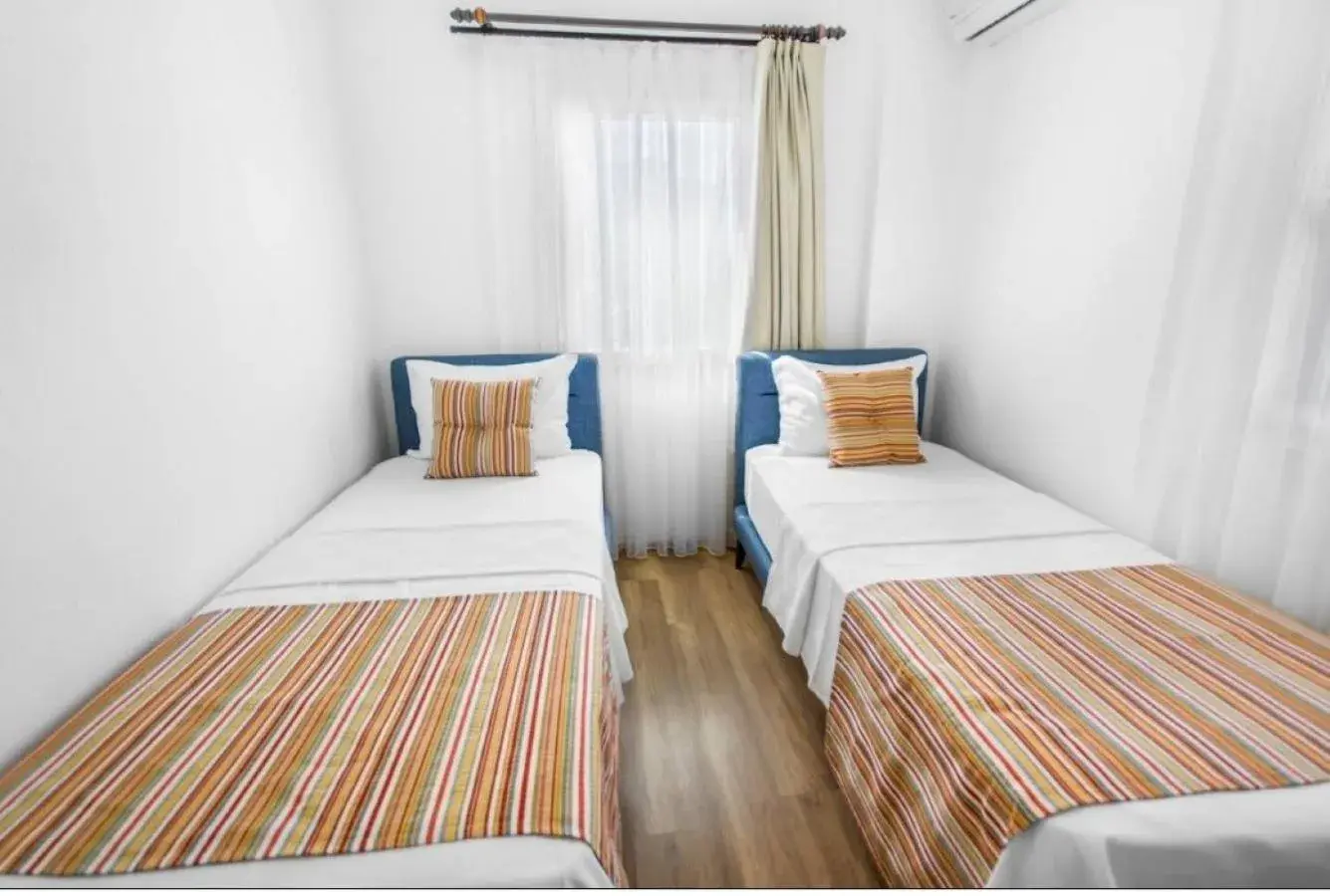Bed in Dibek Homes Villa & Hotel Bed in Dibek Homes Villa & Hotel