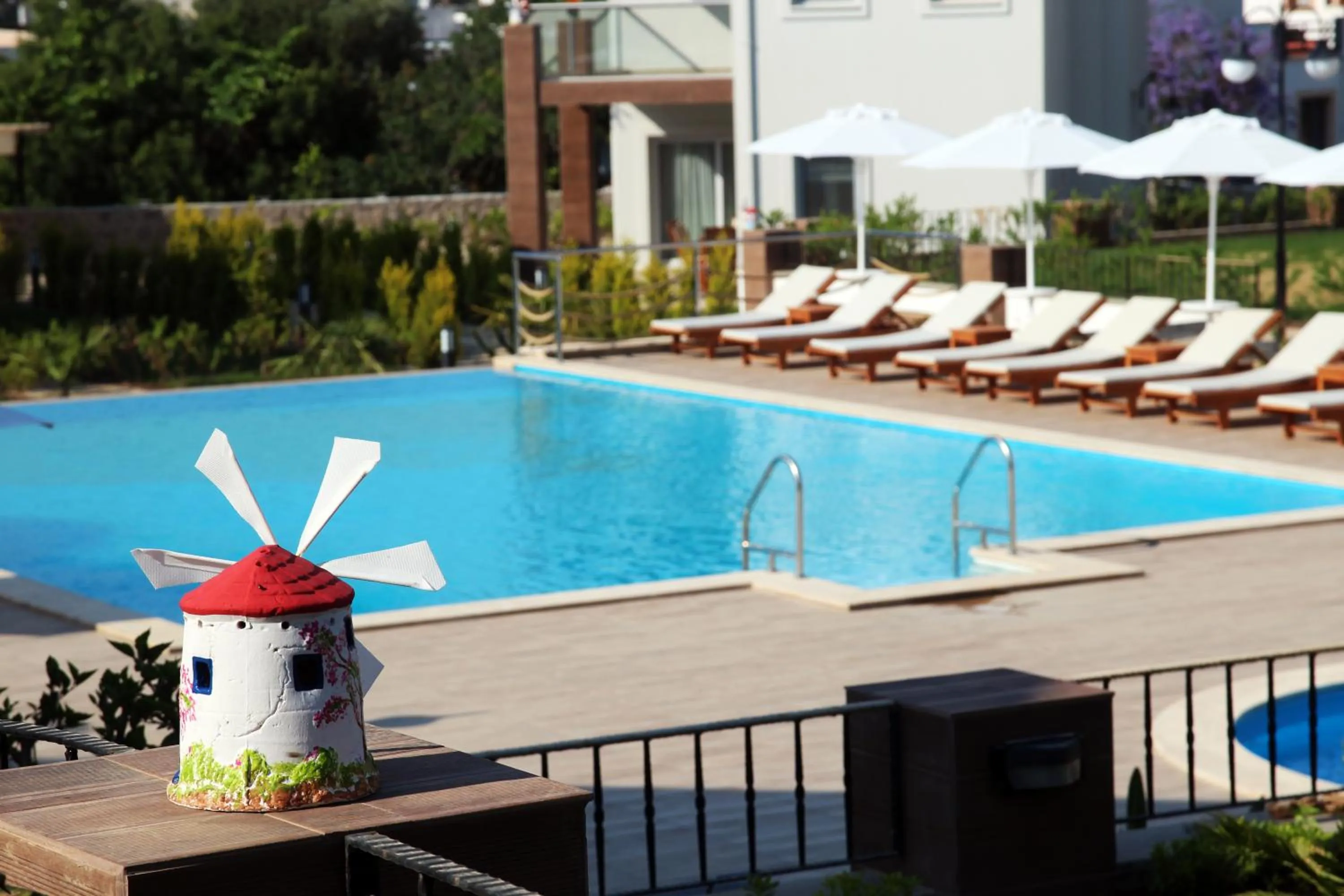 Swimming pool in Dibek Homes Villa & Hotel