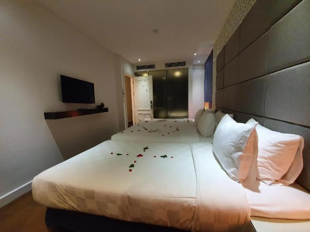 Bed in Le Petit Prince Lakeside Hotel & Rooftop Bar