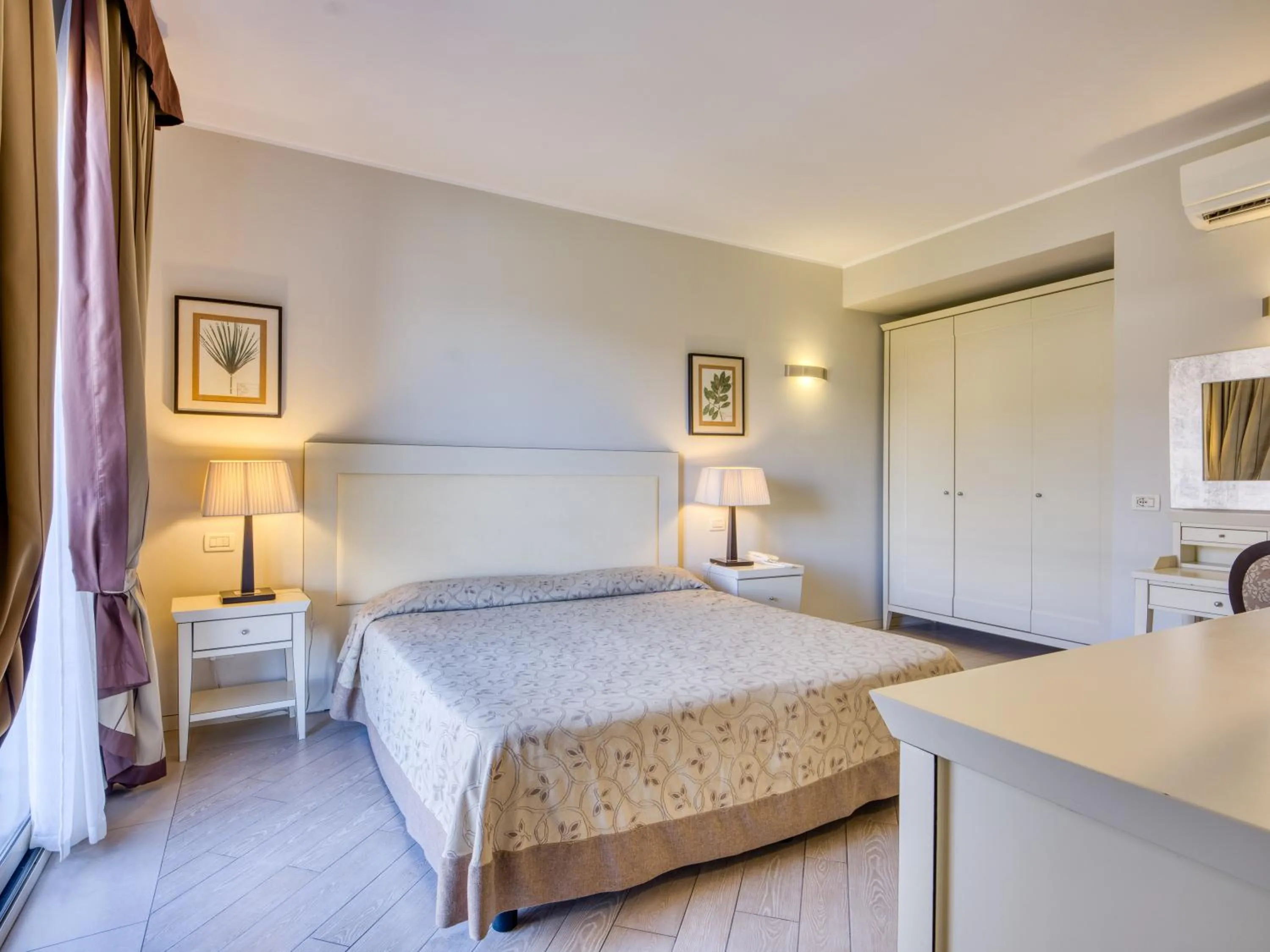 Bedroom, Bed in Parc Hotel Germano Suites & Apartments