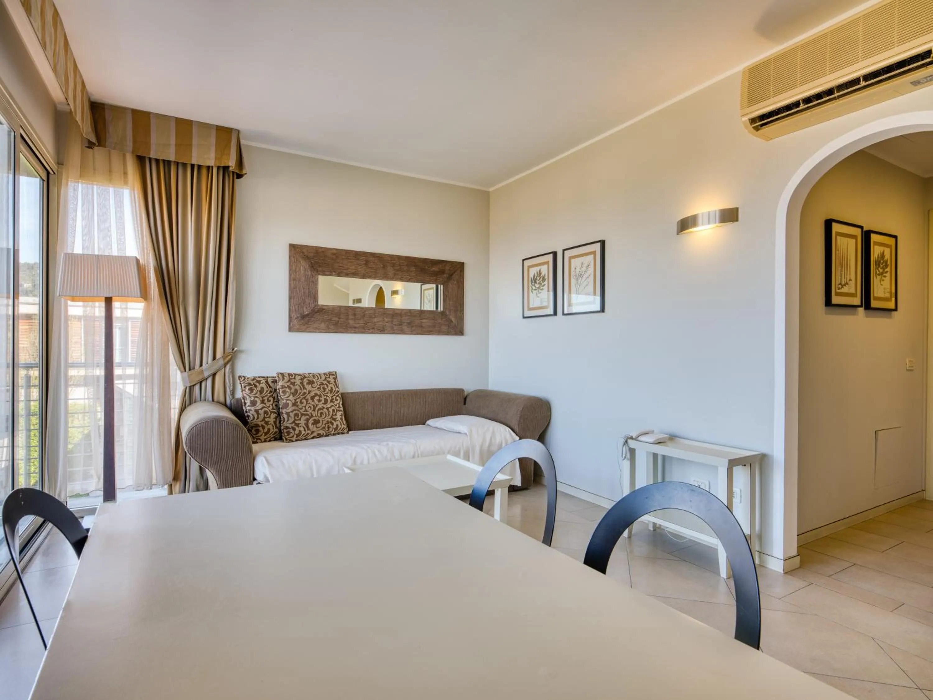 Bed in Parc Hotel Germano Suites & Apartments