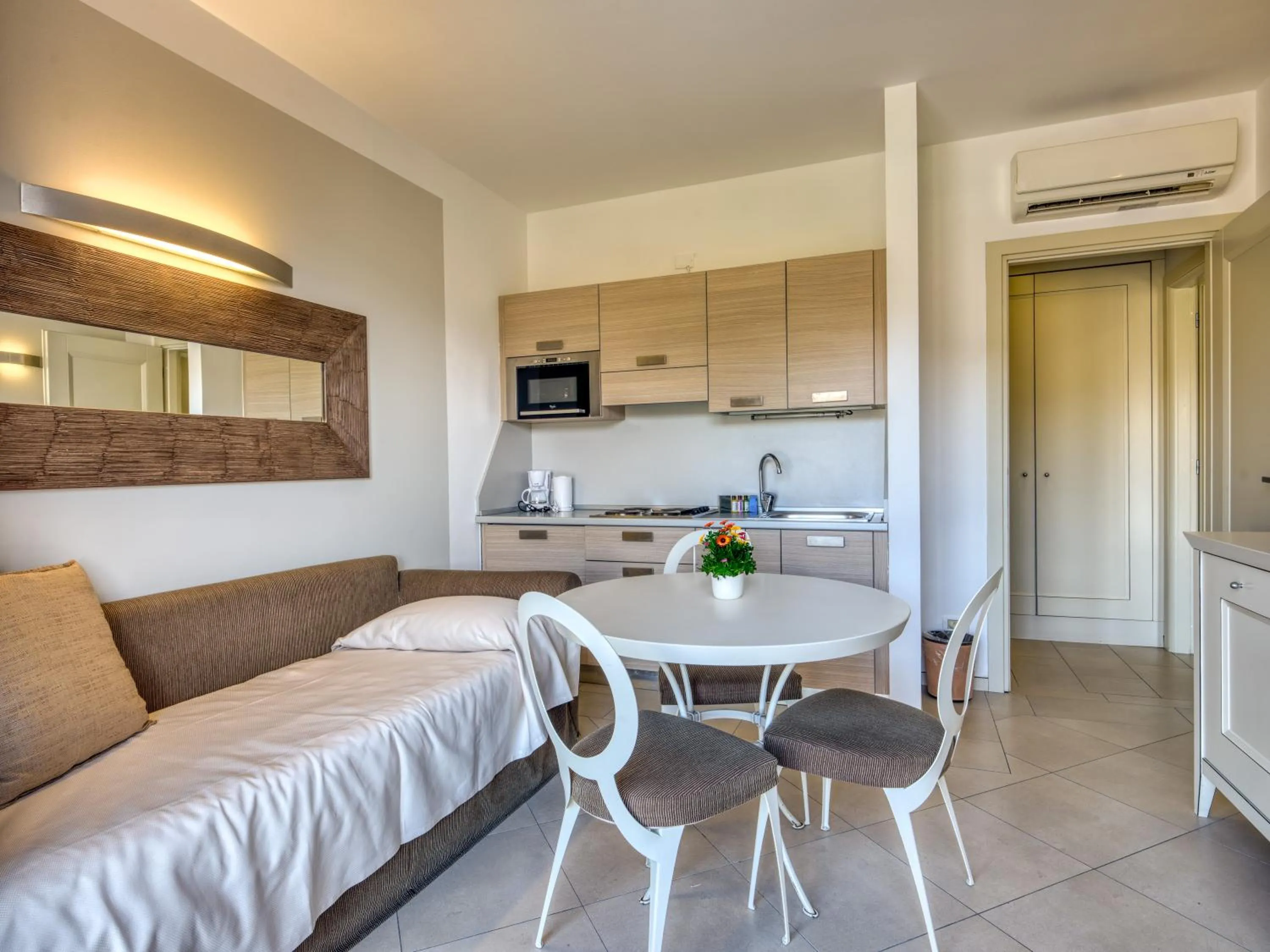 Kitchen or kitchenette in Parc Hotel Germano Suites & Apartments