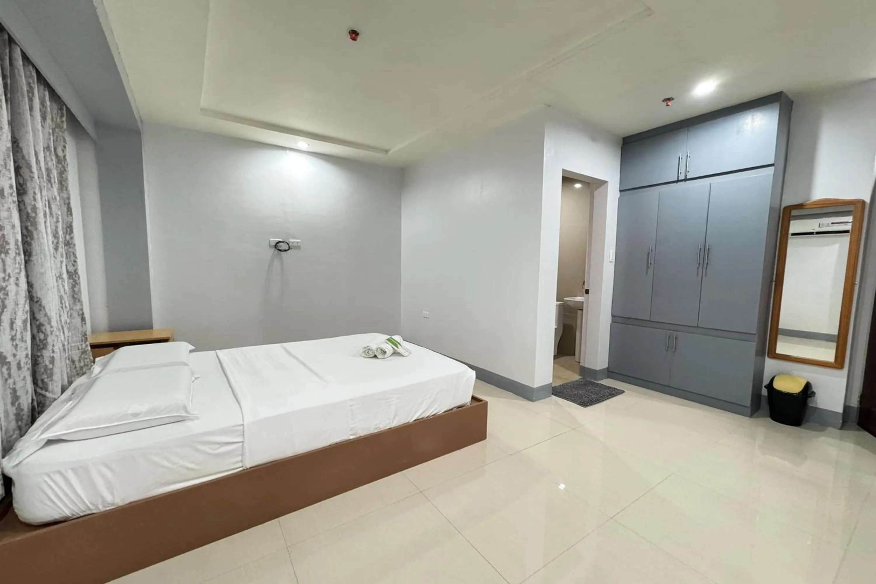 Bed in Hotel Ramon Bukidnon