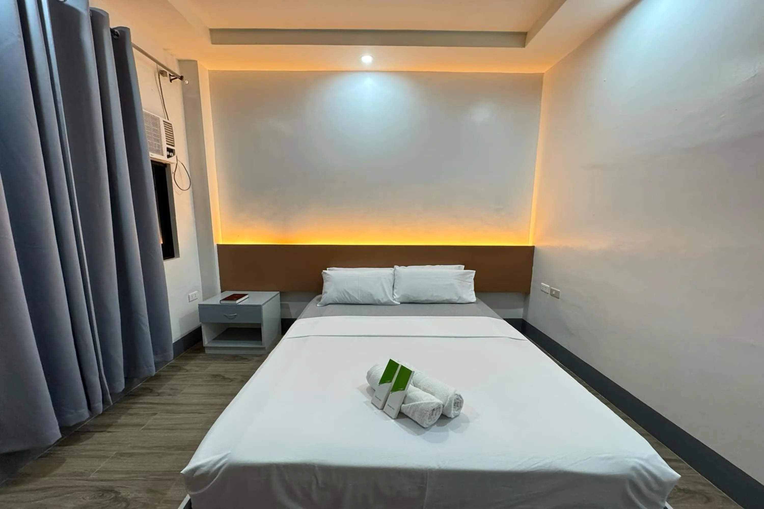 Bed in Hotel Ramon Bukidnon