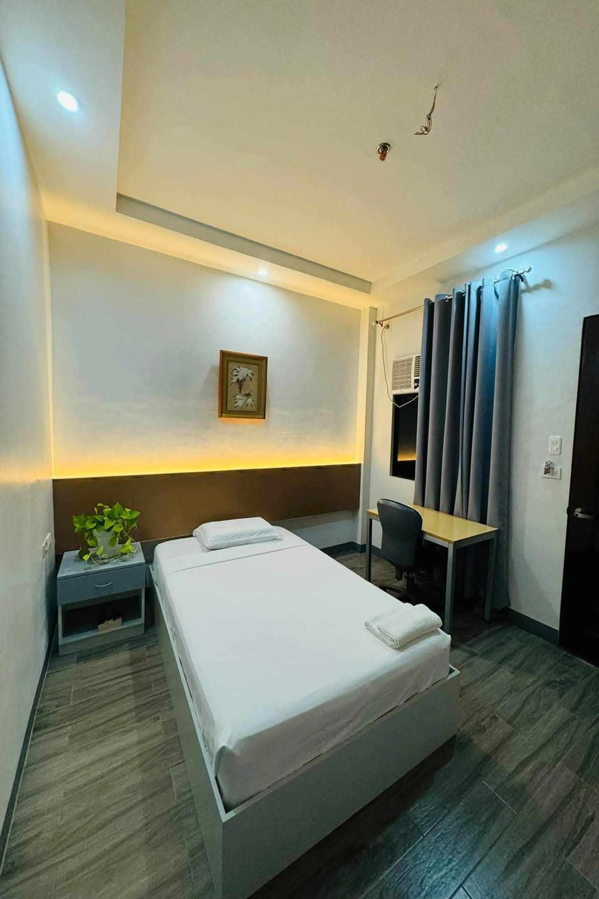Bed in Hotel Ramon Bukidnon