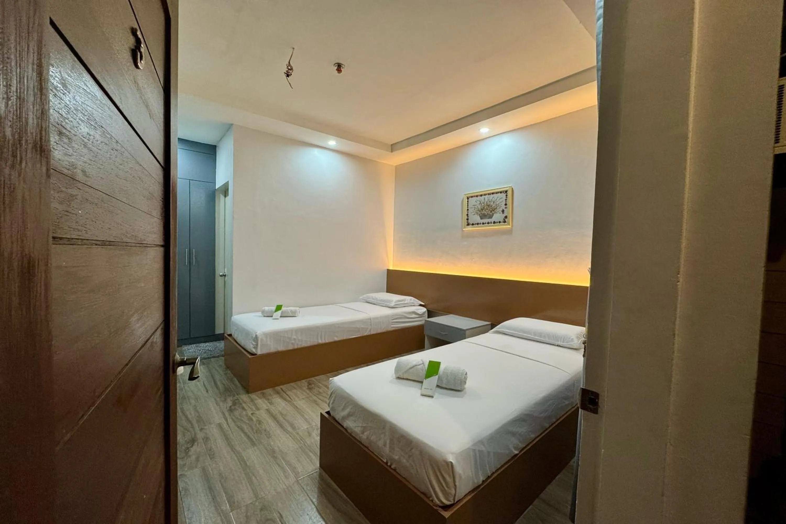 Bed in Hotel Ramon Bukidnon