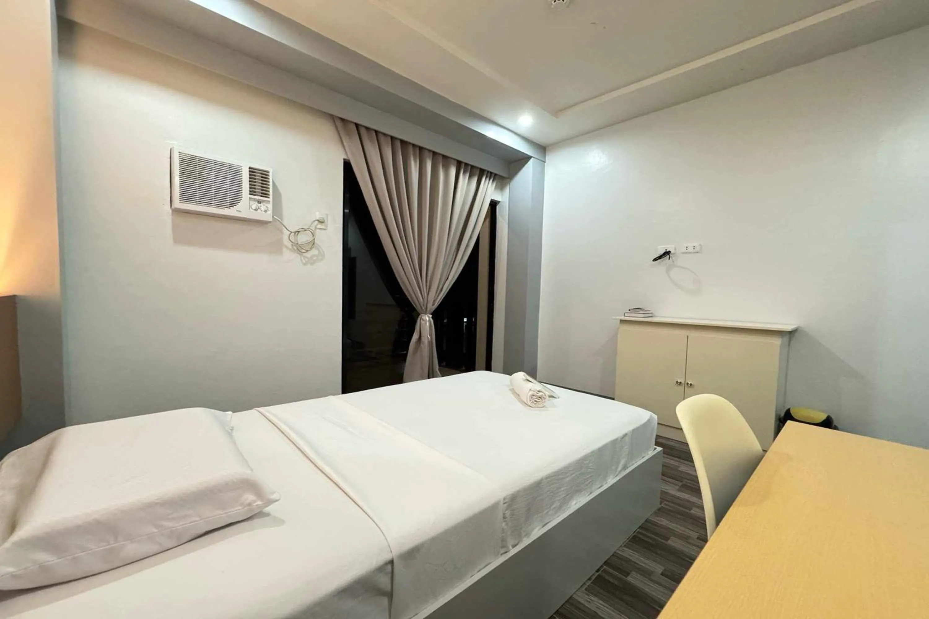 Bed in Hotel Ramon Bukidnon