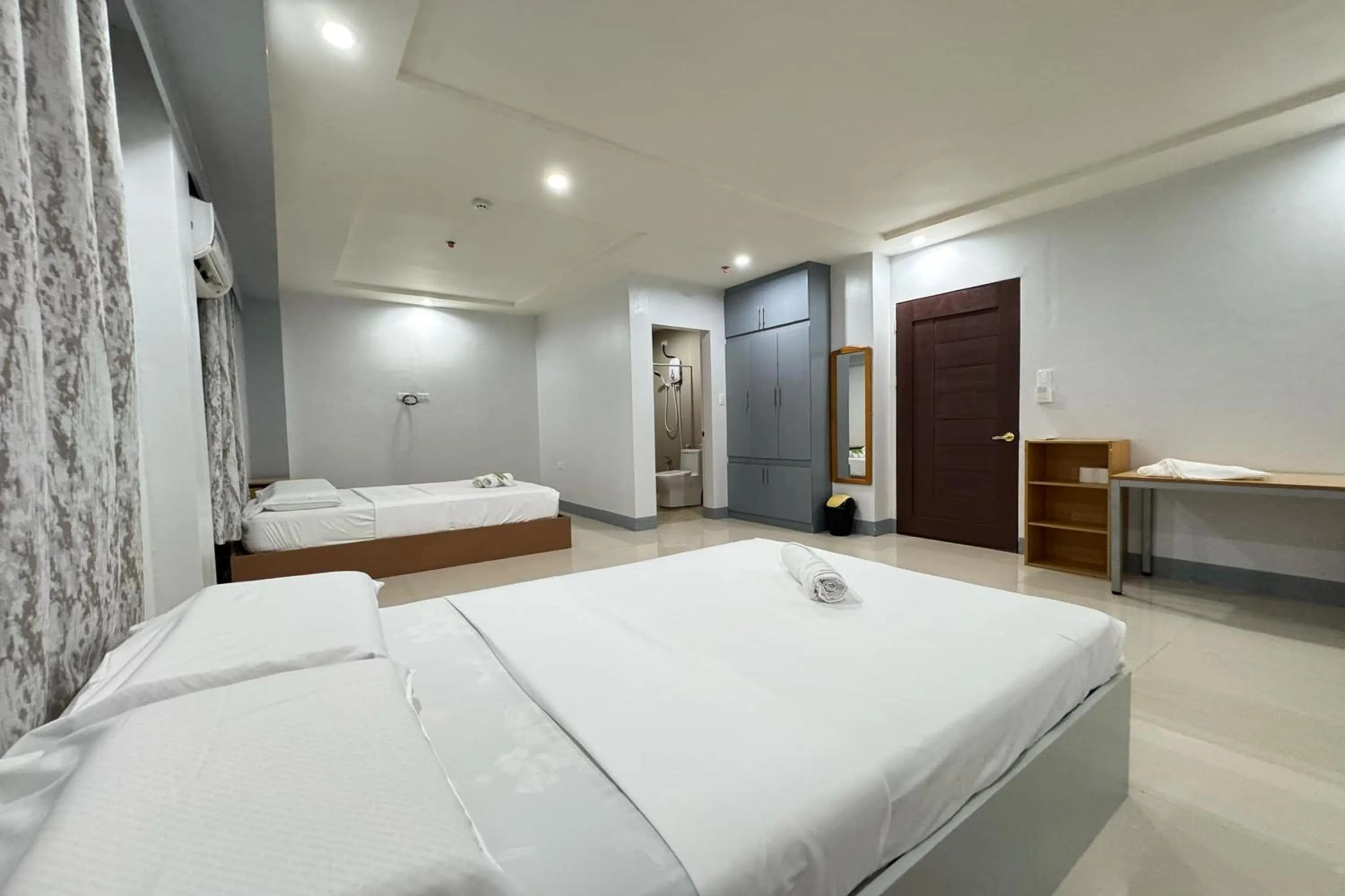Bed in Hotel Ramon Bukidnon