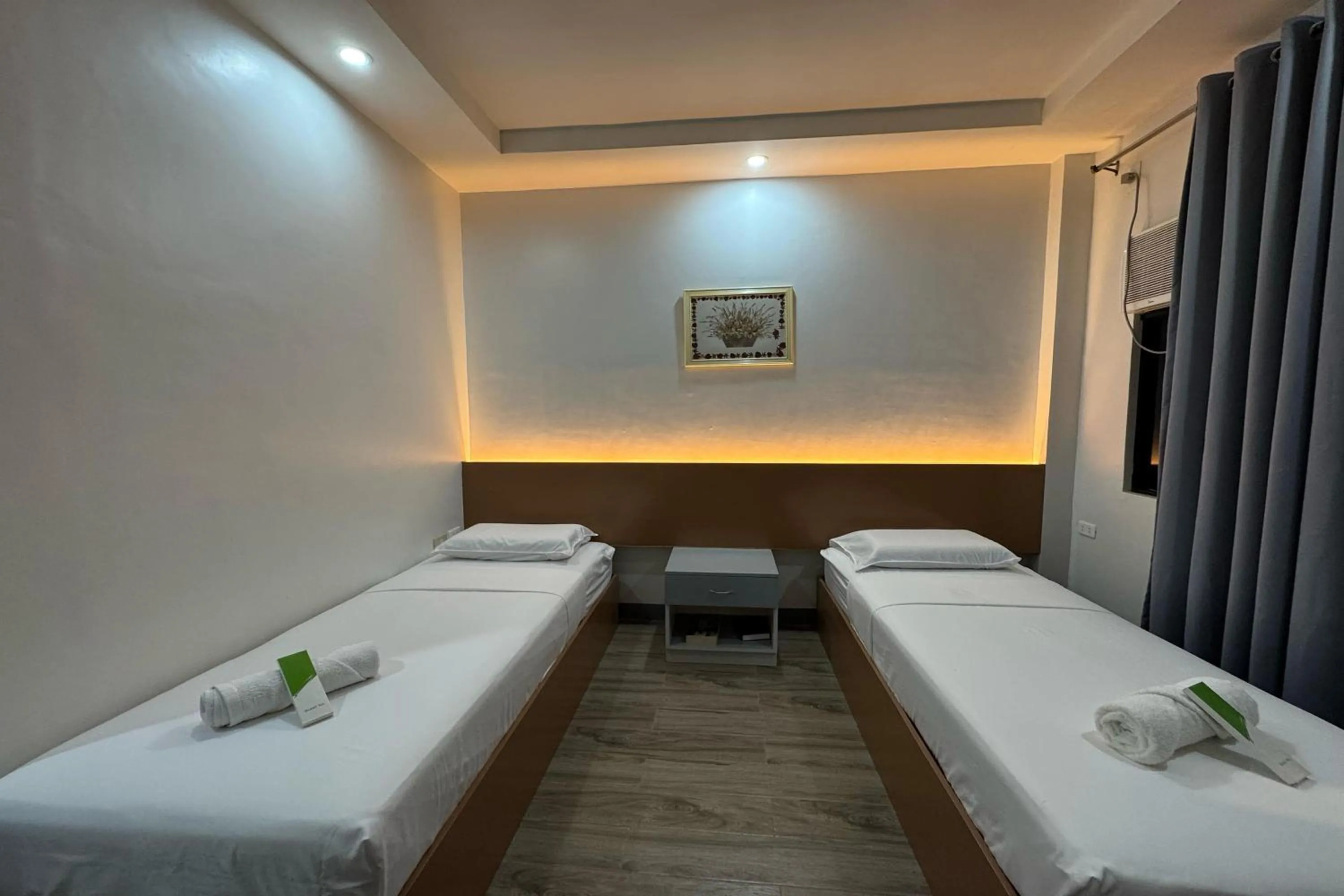 Bed in Hotel Ramon Bukidnon