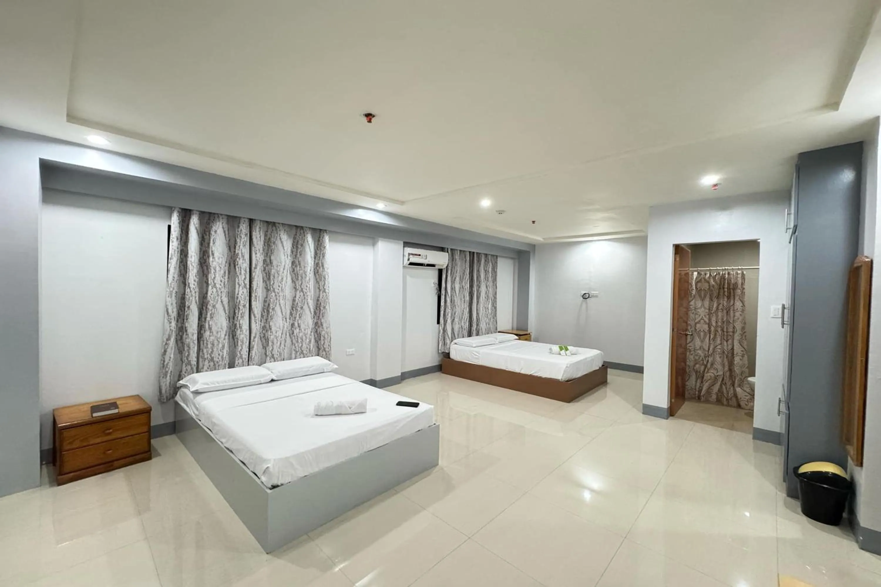 Bed in Hotel Ramon Bukidnon