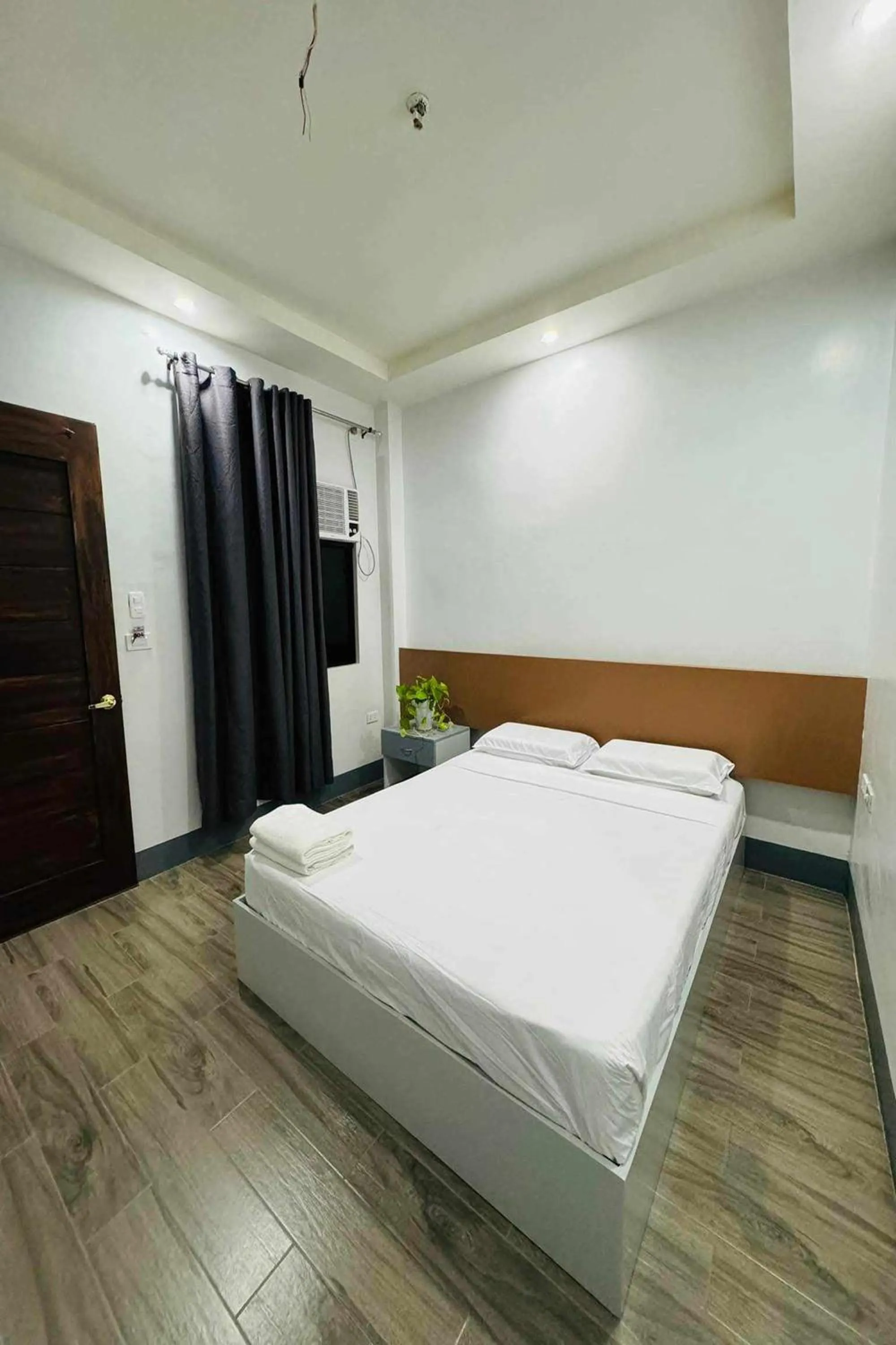 Bed in Hotel Ramon Bukidnon