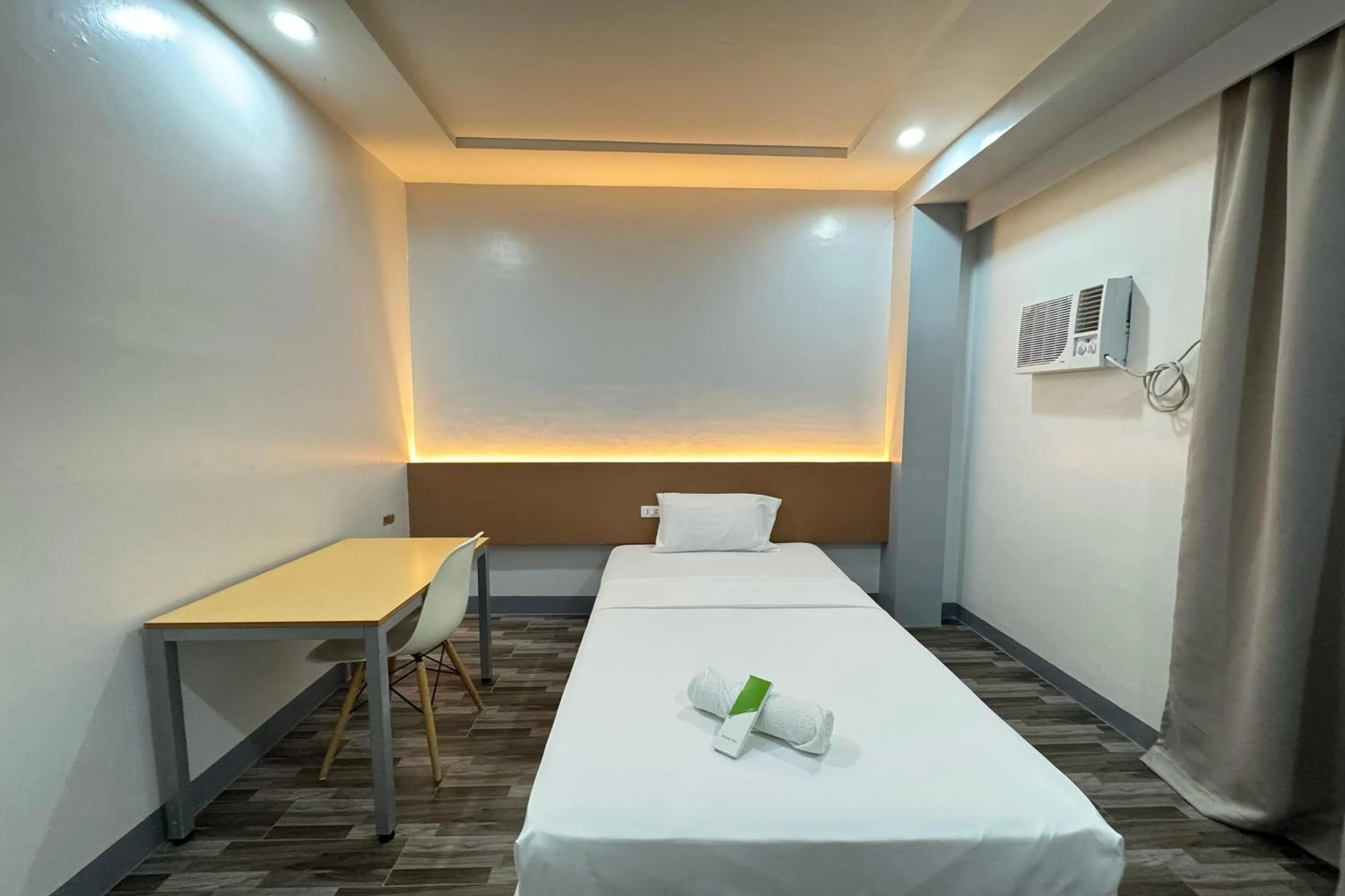 Bed in Hotel Ramon Bukidnon