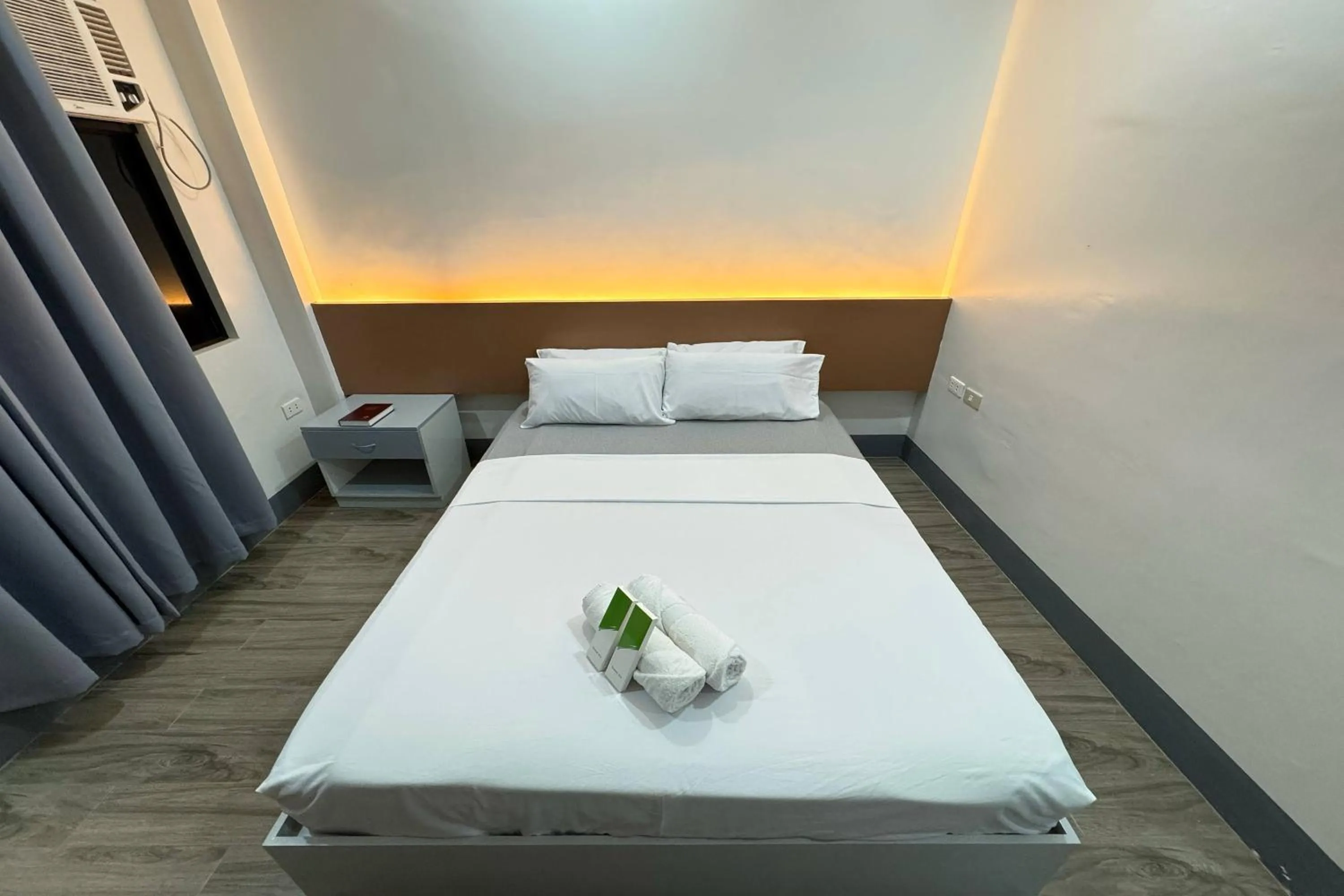 Bed in Hotel Ramon Bukidnon