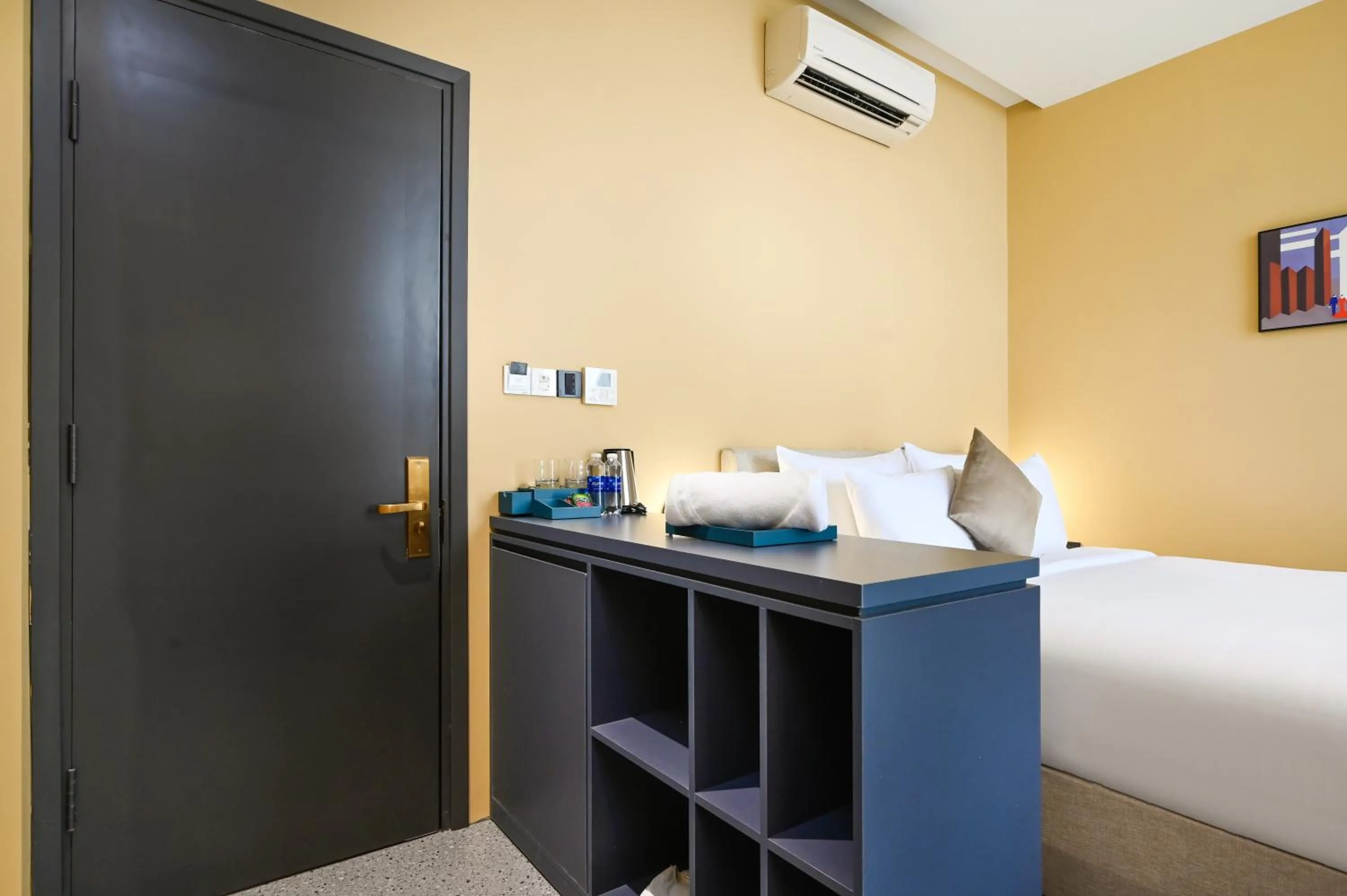 Bed in Brown Dot Hotel Saigon Airport