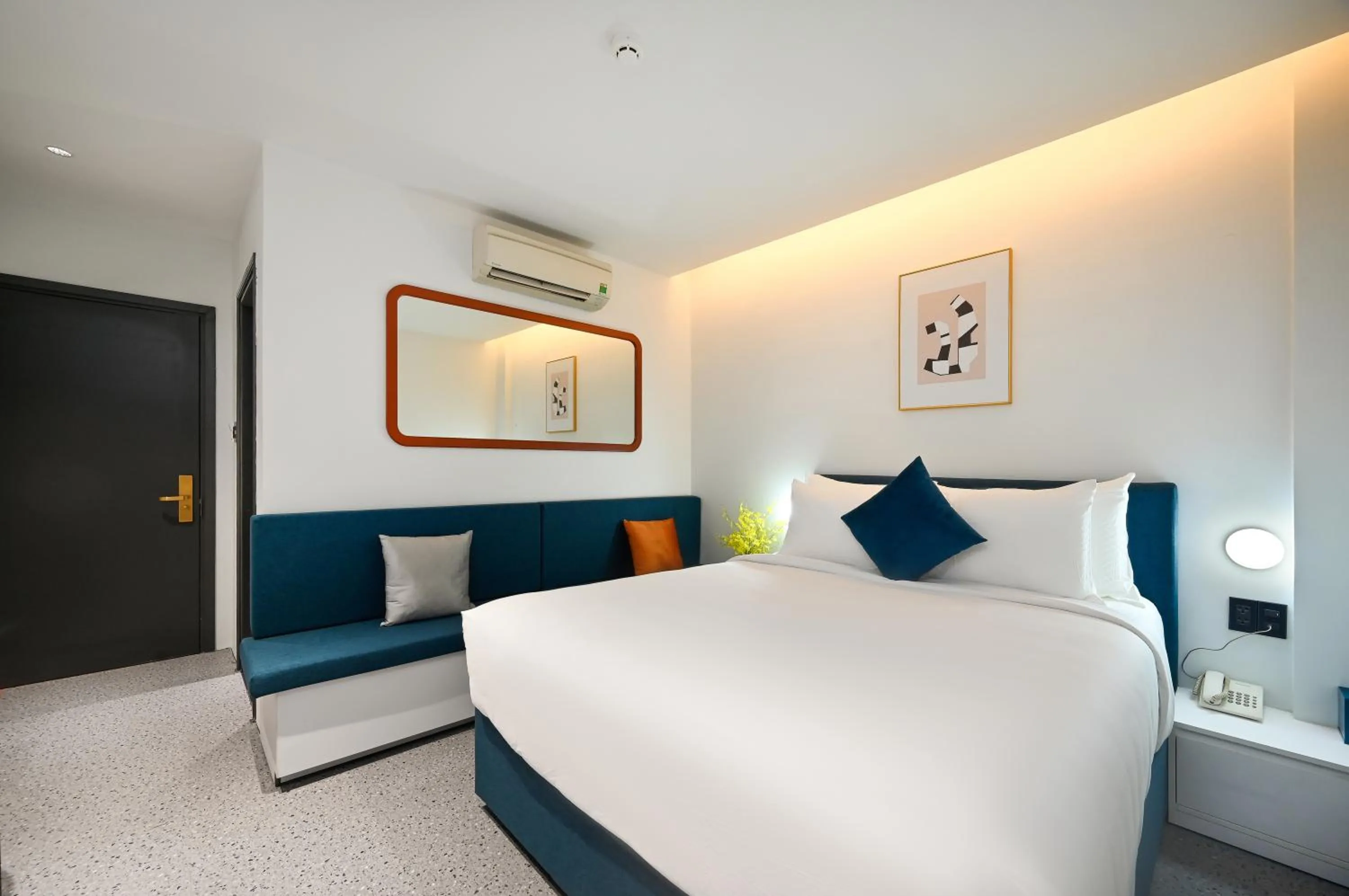 Bed in Brown Dot Hotel Saigon Airport