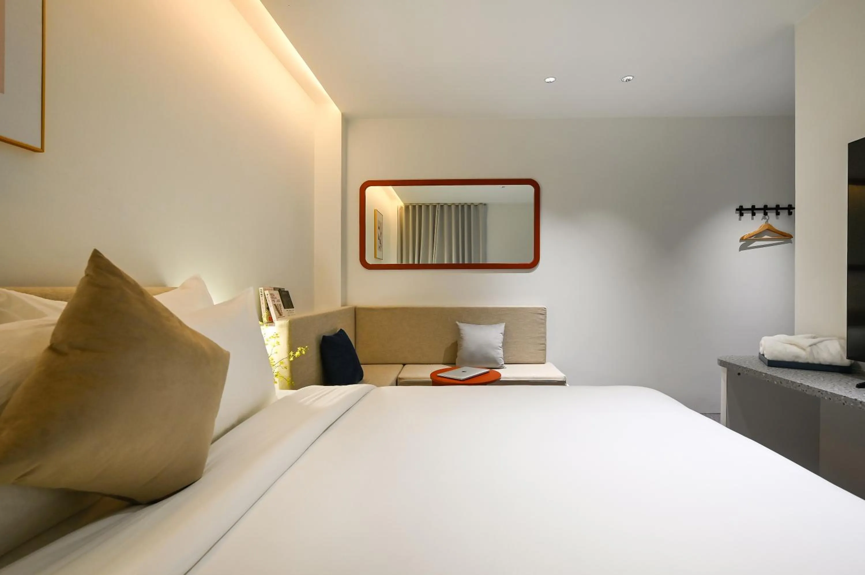 Bed in Brown Dot Hotel Saigon Airport