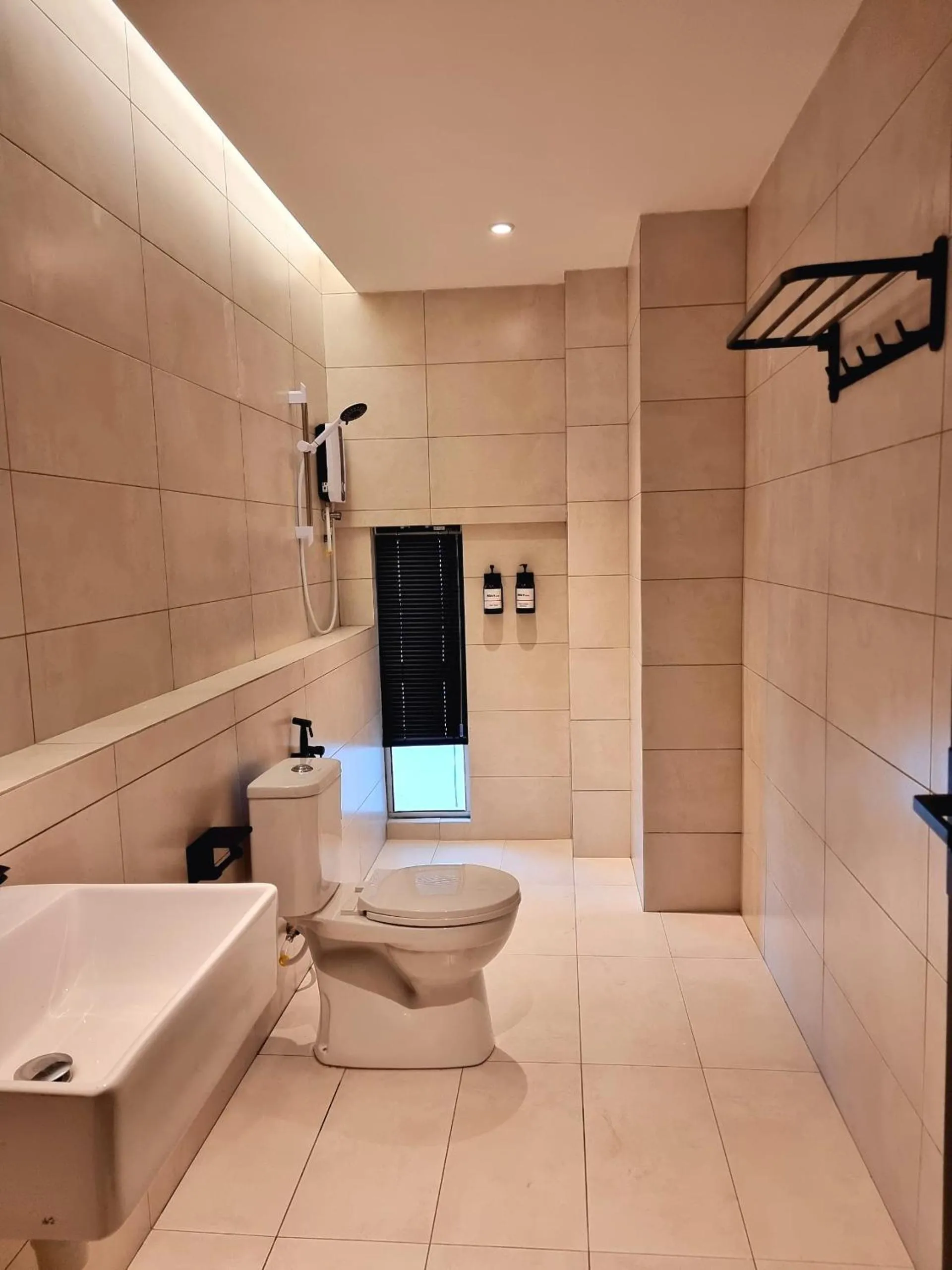 Bathroom in Roxy Hotel Malihah