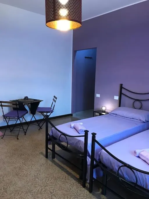 Bed in Le sorelle gemelle B&B