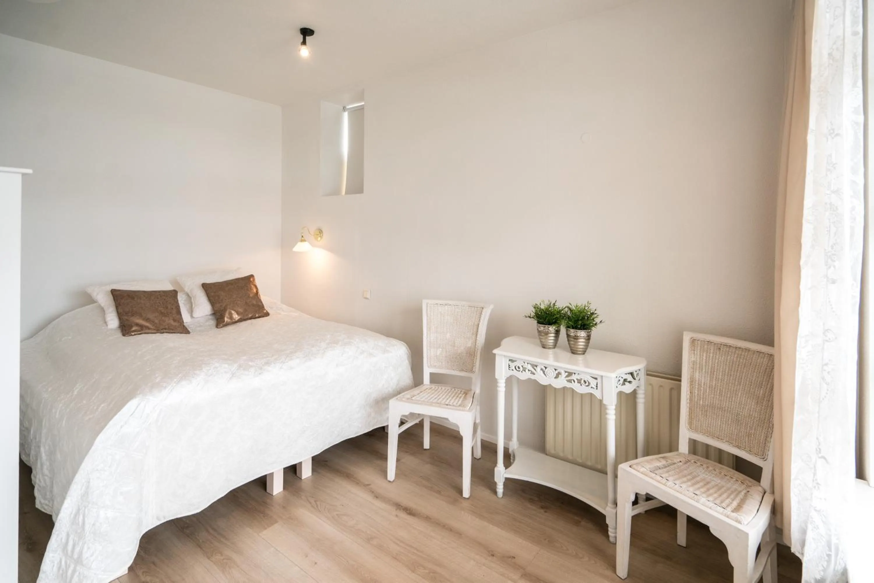 Bed in River Apartments