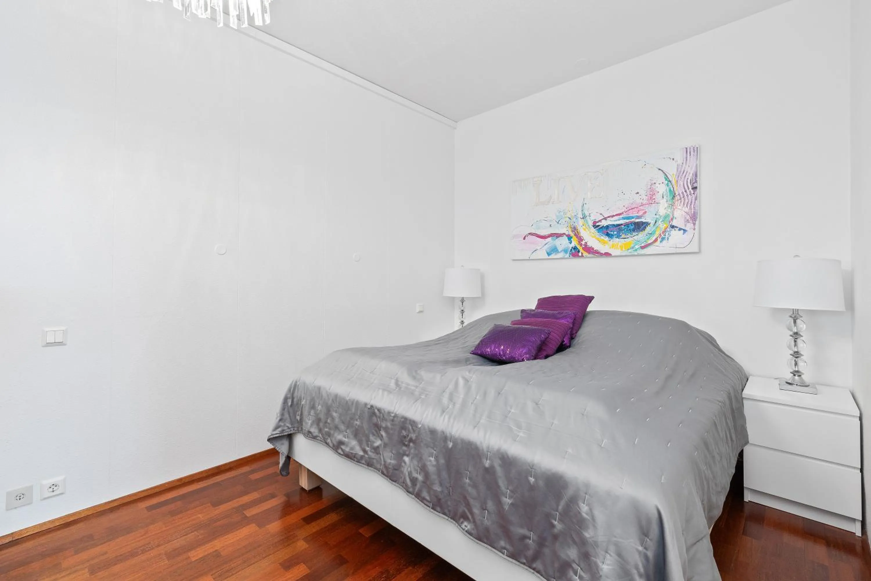 Bed in River Apartments