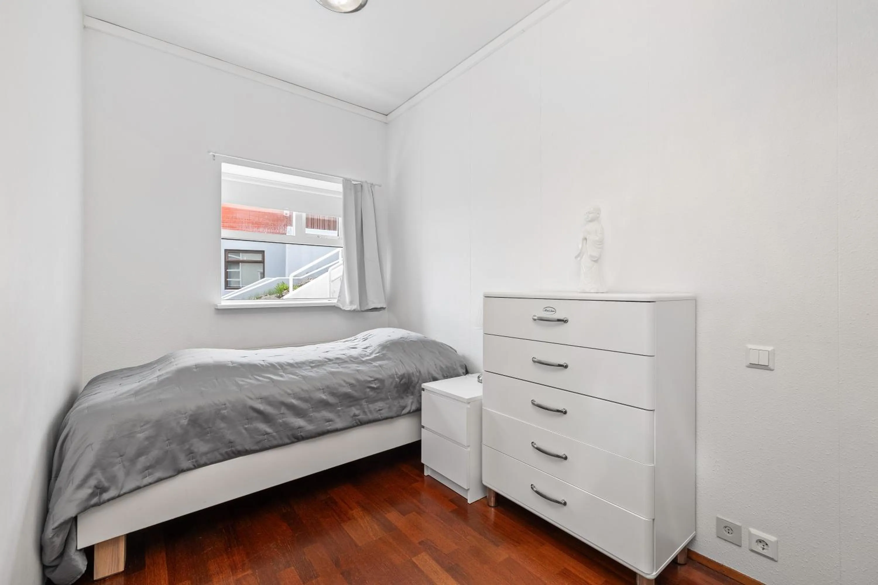 Bed in River Apartments