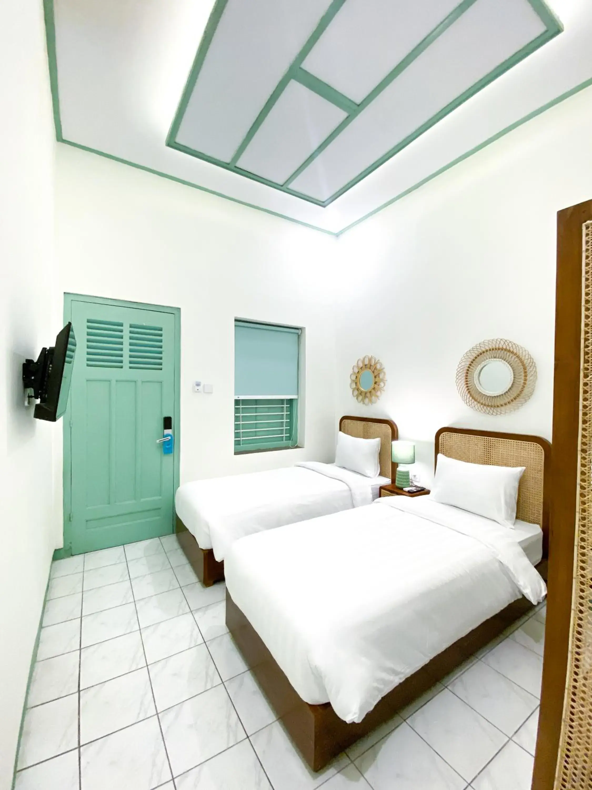 Deluxe Twin Room in The Utara Hotel Tugu by Eresha Hospitality Deluxe Twin Room in The Utara Hotel Tugu by Eresha Hospitality