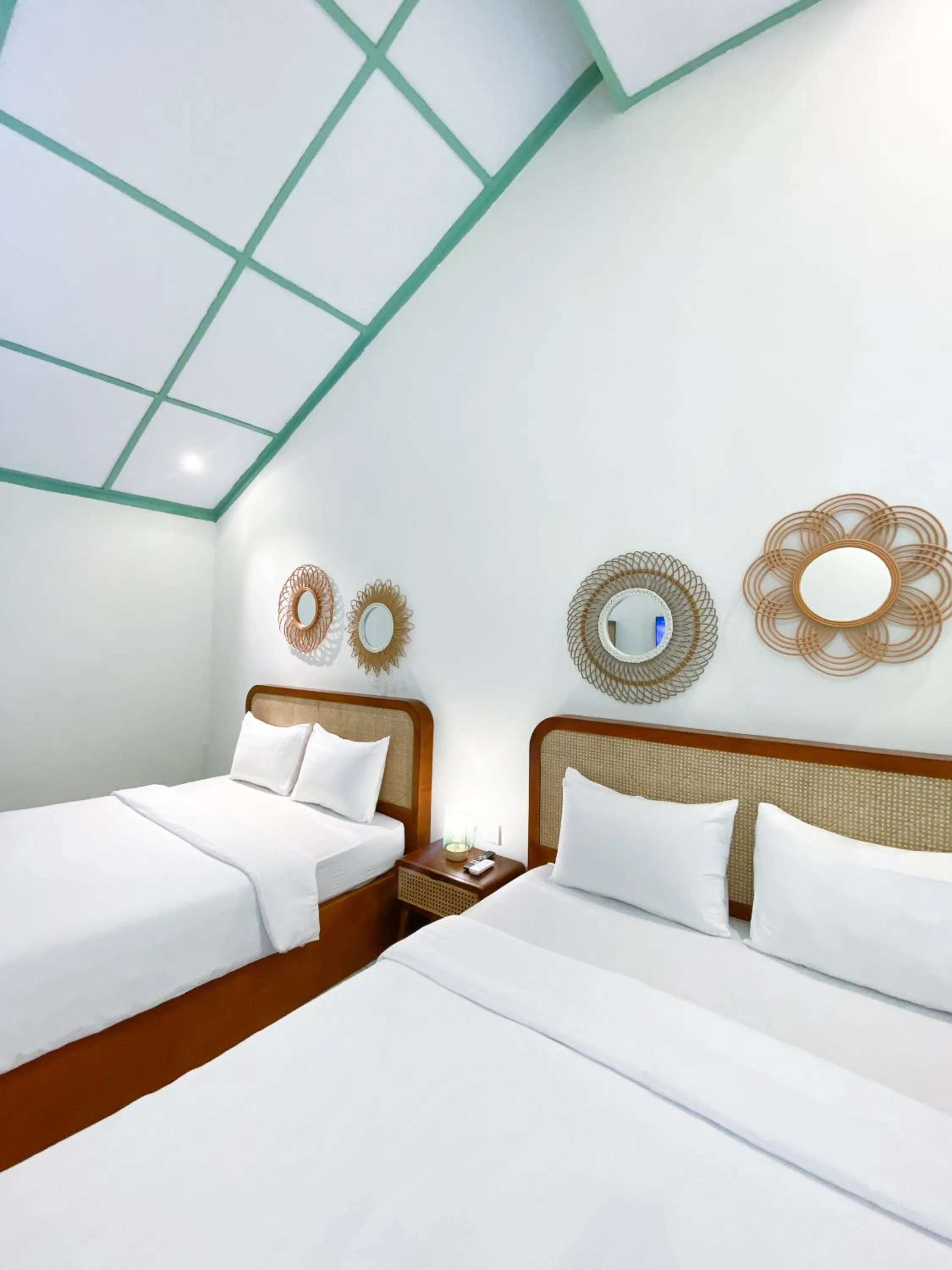 Bed in The Utara Hotel Tugu by Eresha Hospitality