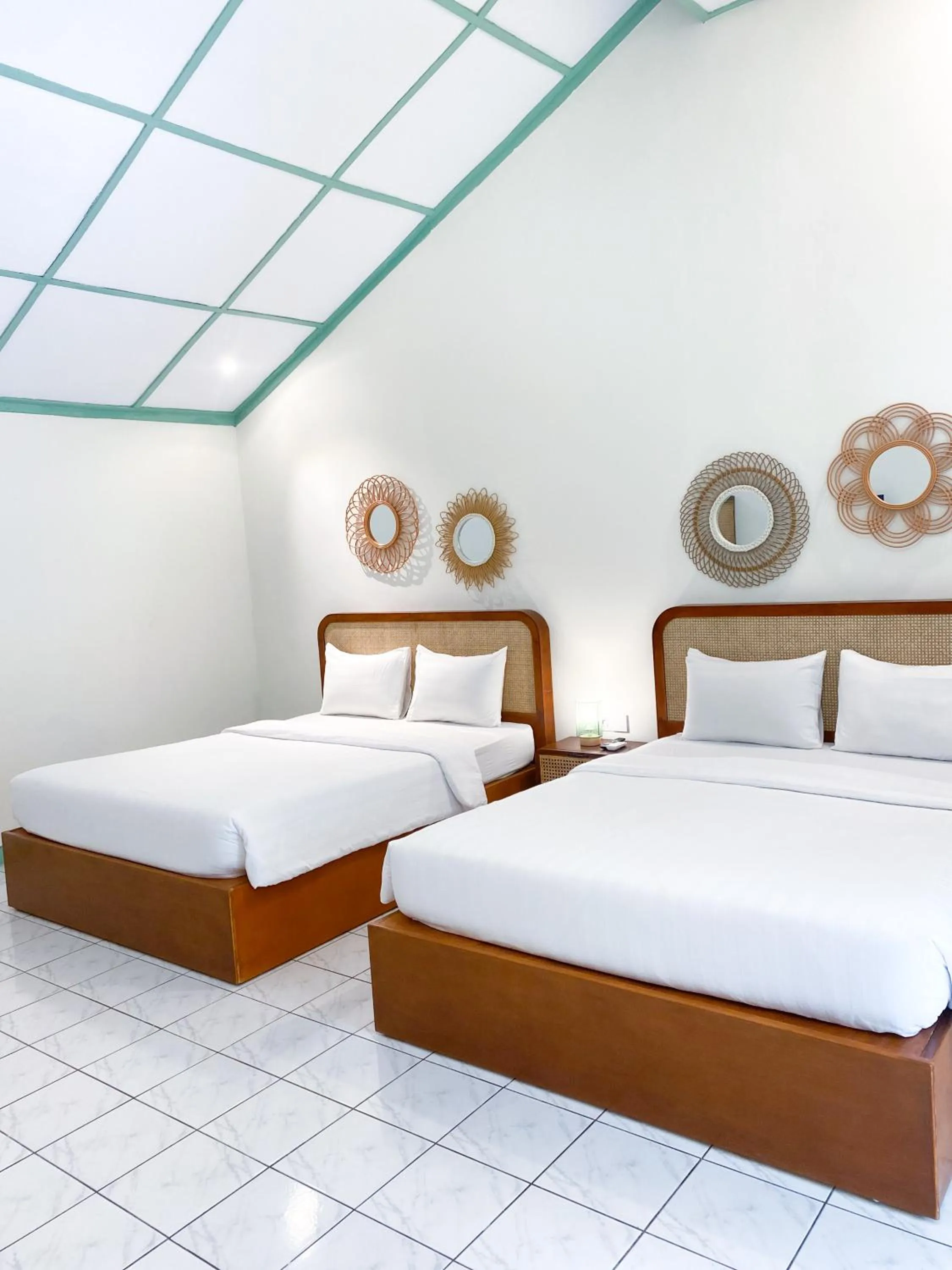 Bed in The Utara Hotel Tugu by Eresha Hospitality