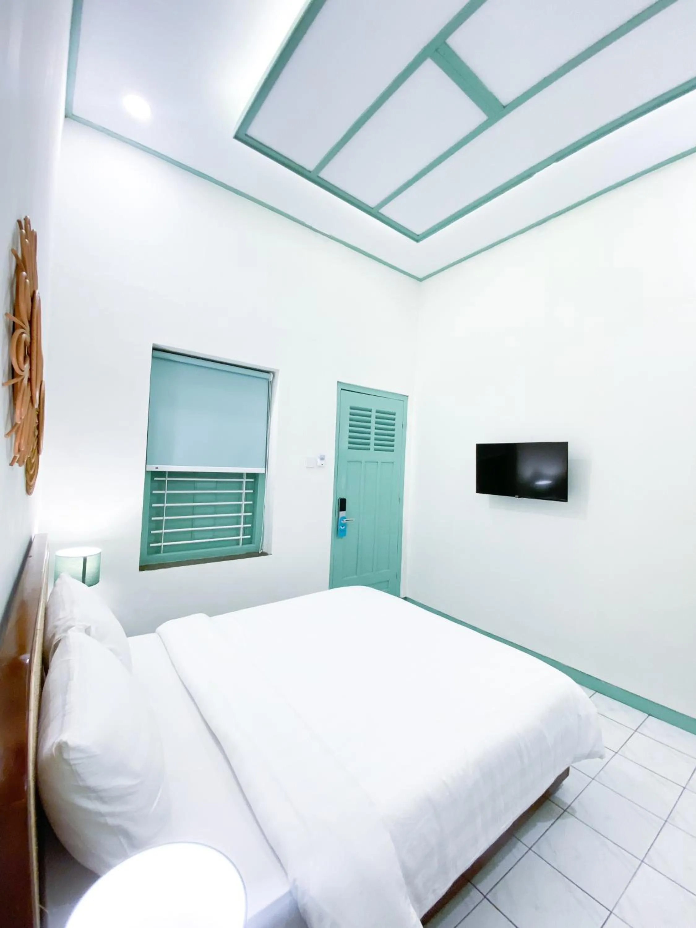 Bed in The Utara Hotel Tugu by Eresha Hospitality