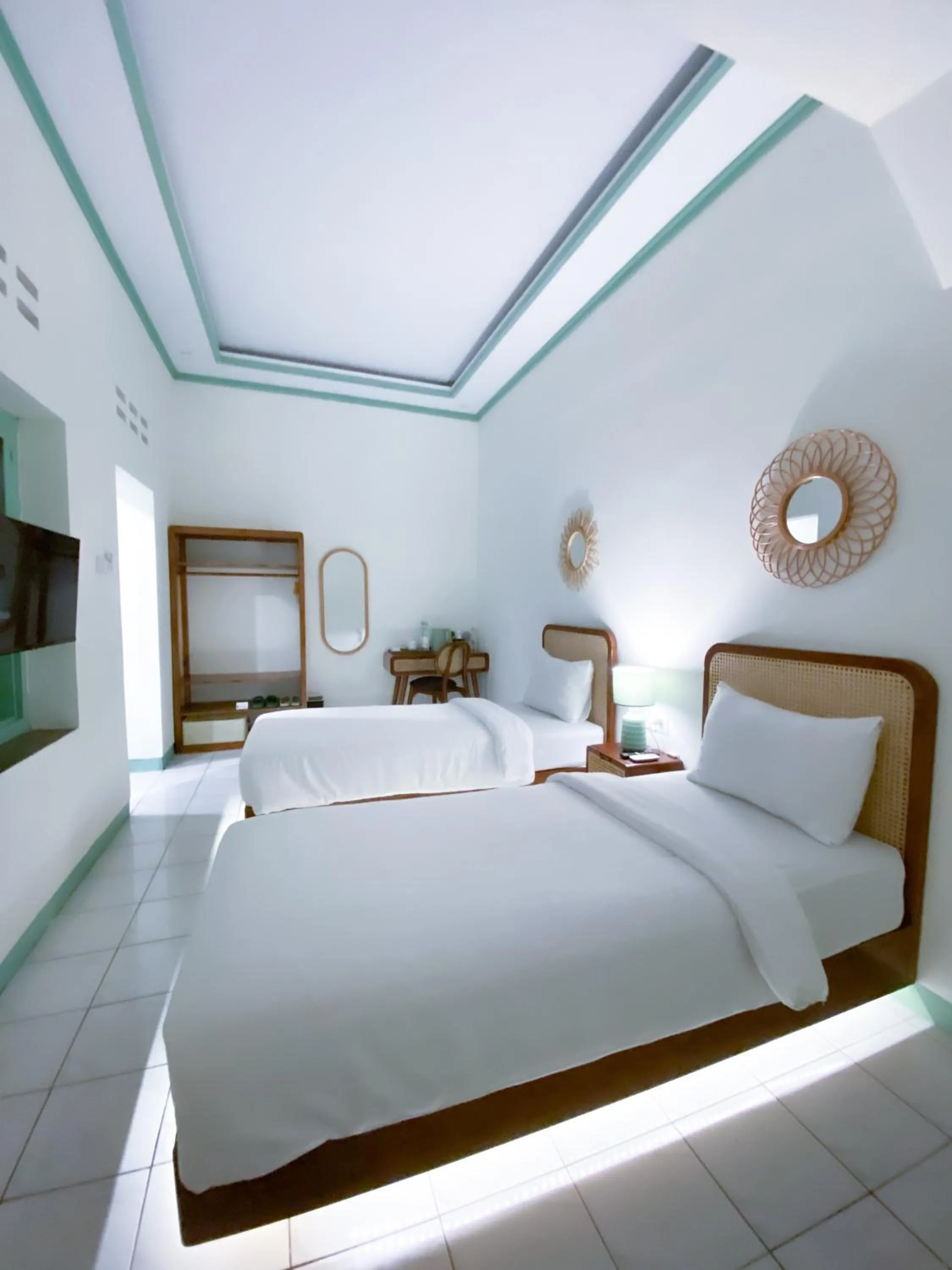 Bed in The Utara Hotel Tugu by Eresha Hospitality