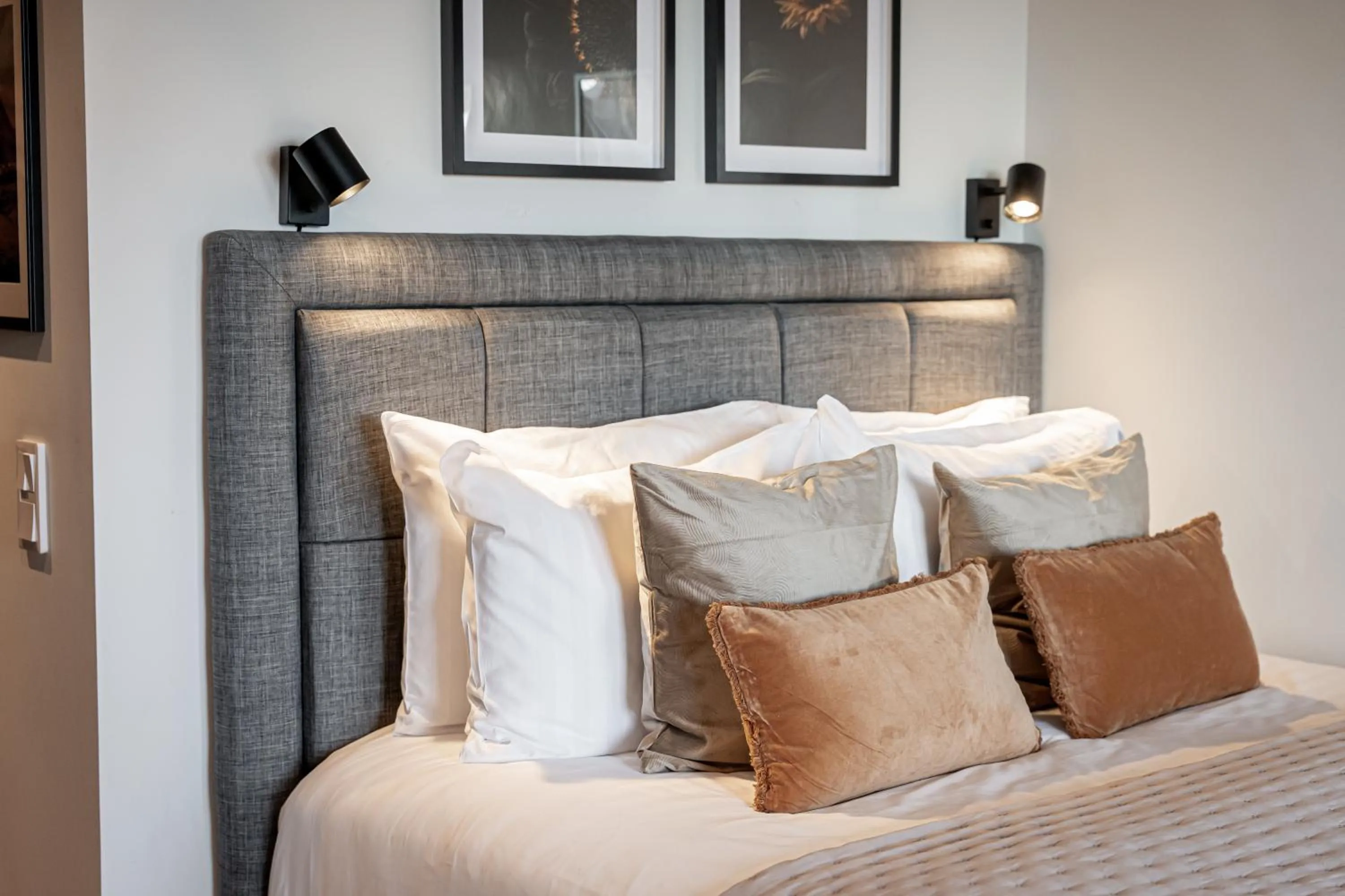 Bed in Injoy Premium Hotel Uppsala