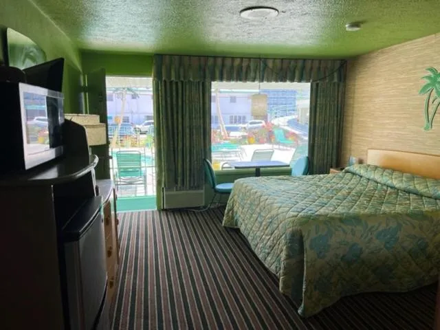 Bed in Caribbean Motel