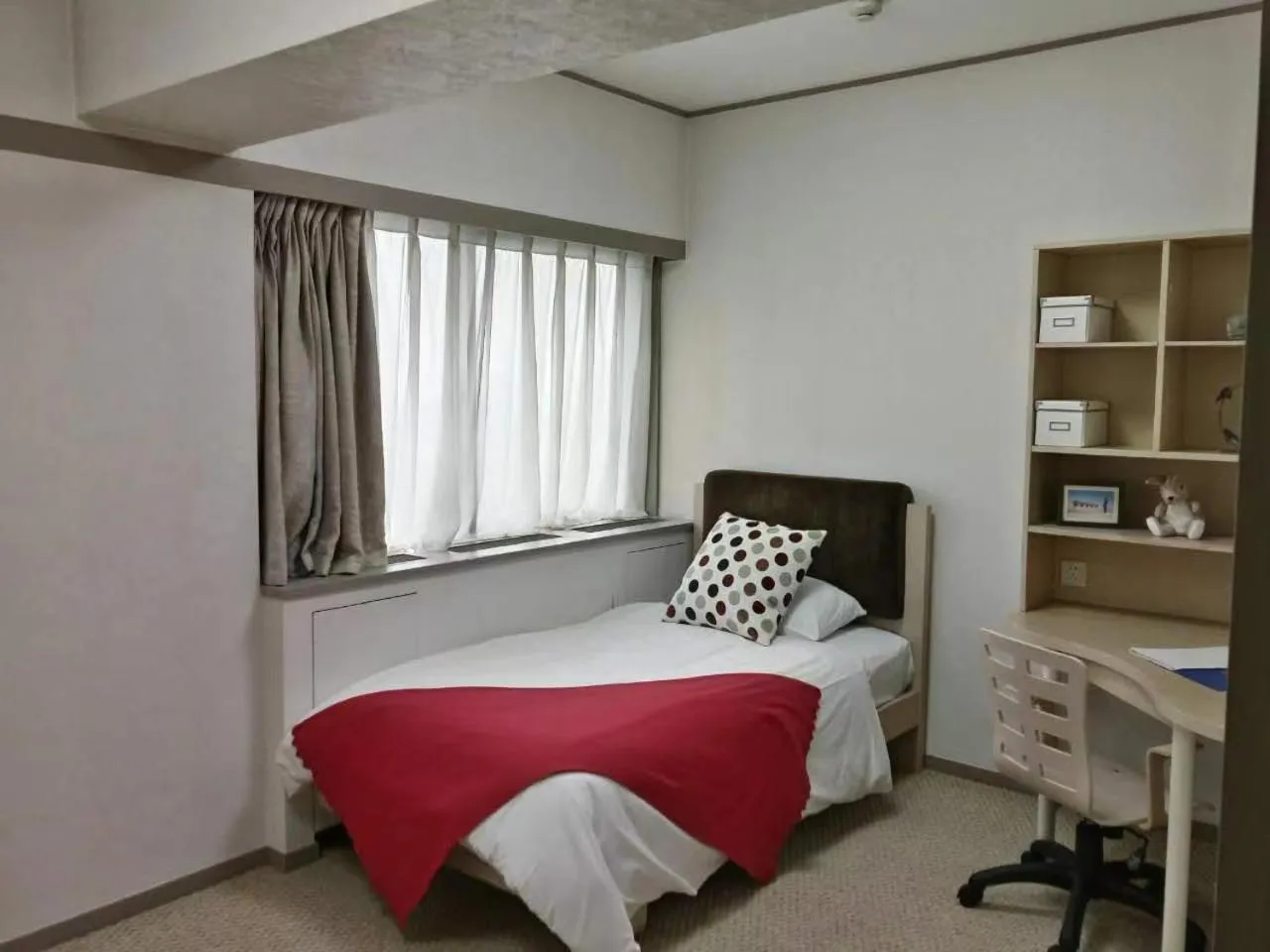 Bed in Beijing Jiuxian Apartment