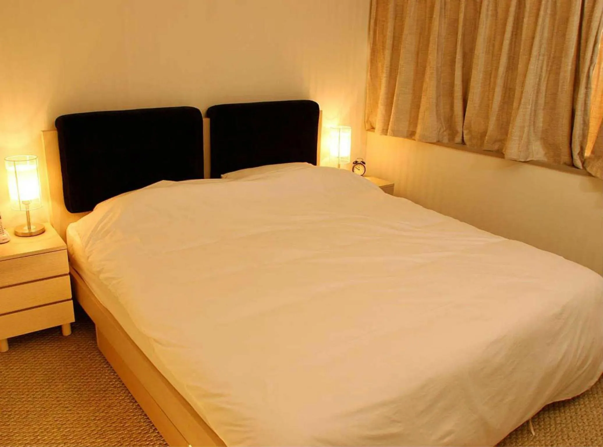 Bed in Beijing Jiuxian Apartment