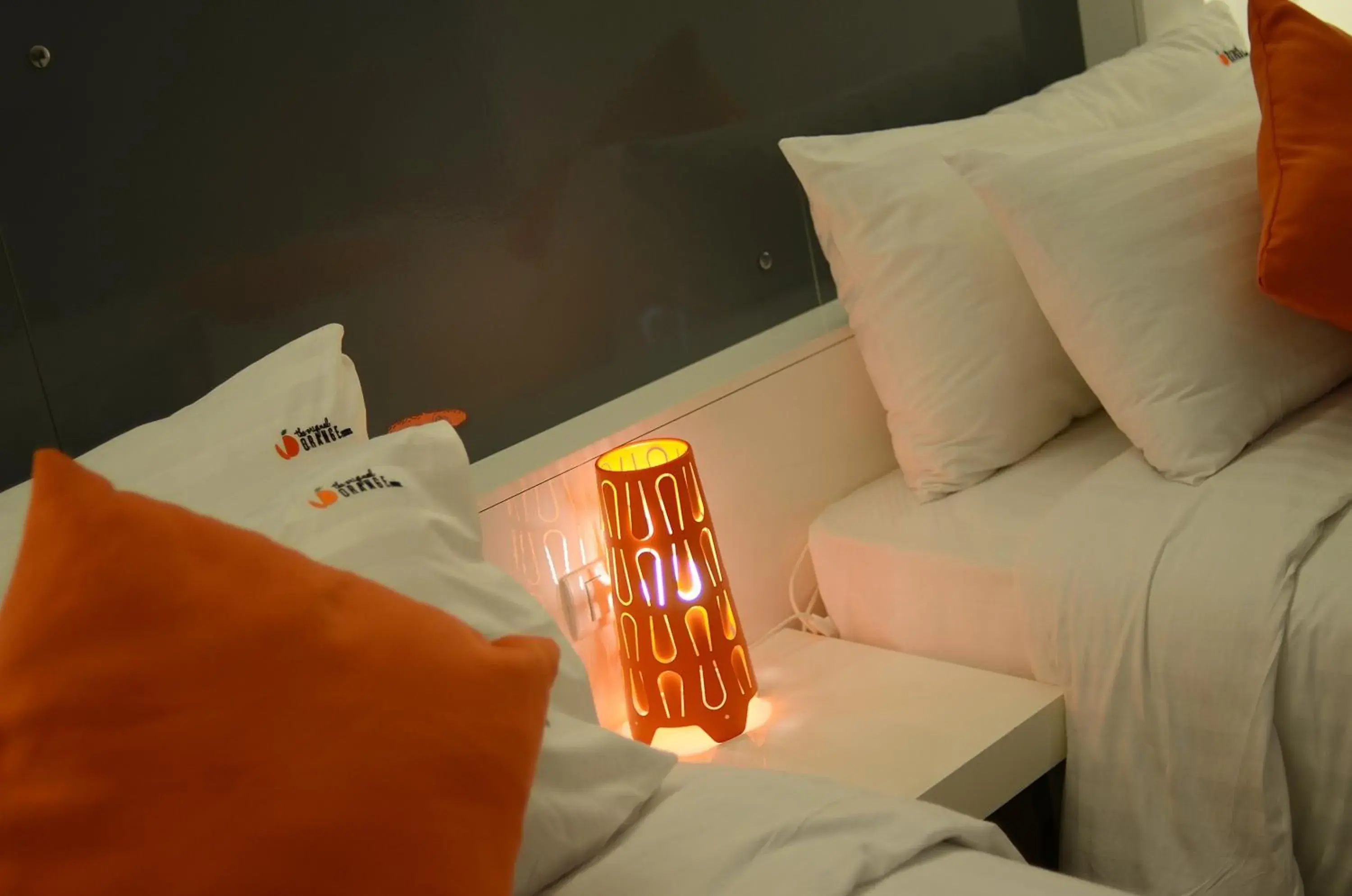 Bed in The Original Orange Hotel Bed in The Original Orange Hotel