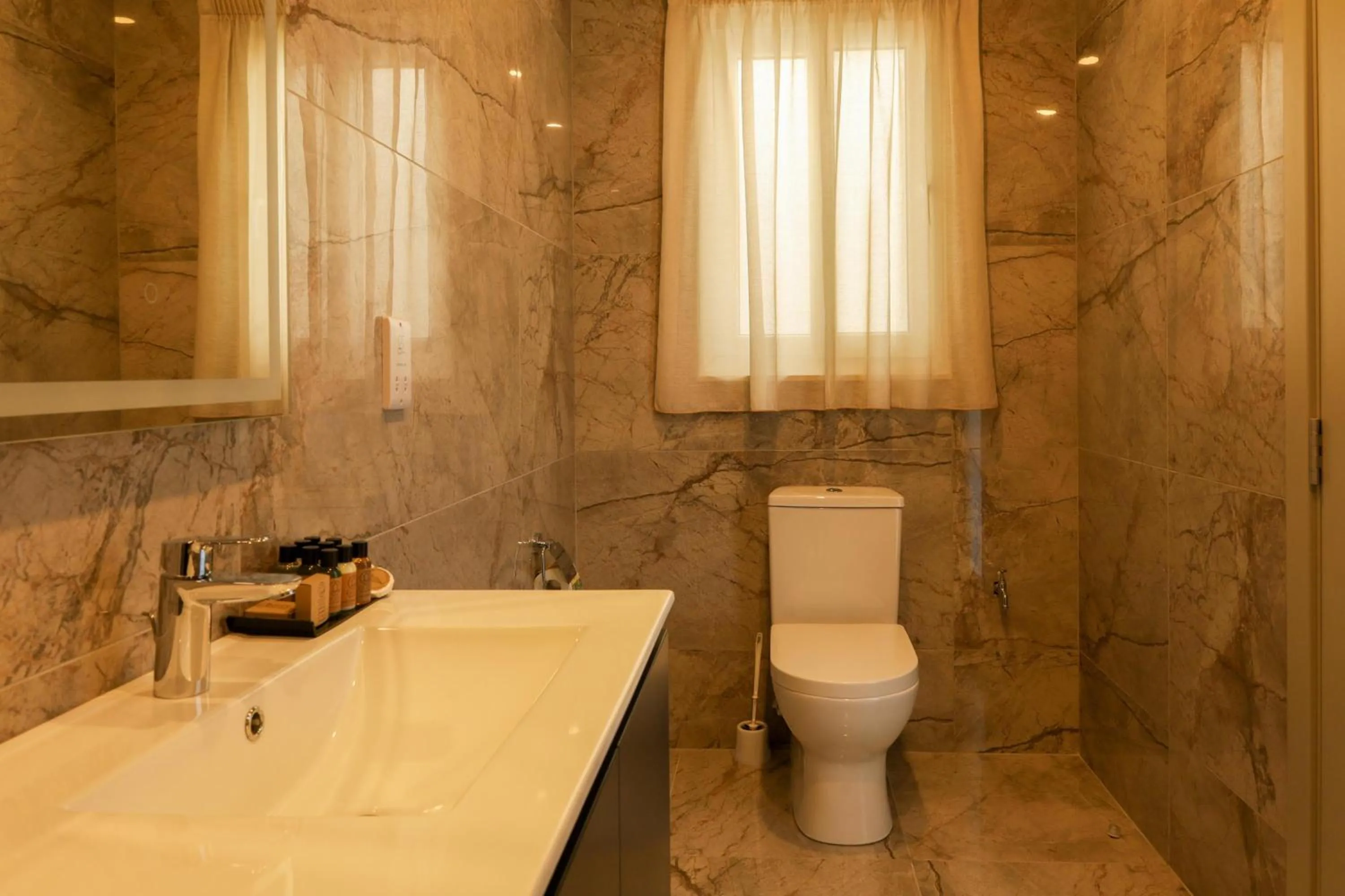 Bathroom in Magnifica Gozitan Villa Pool And Jacuzzi - Happy Rentals