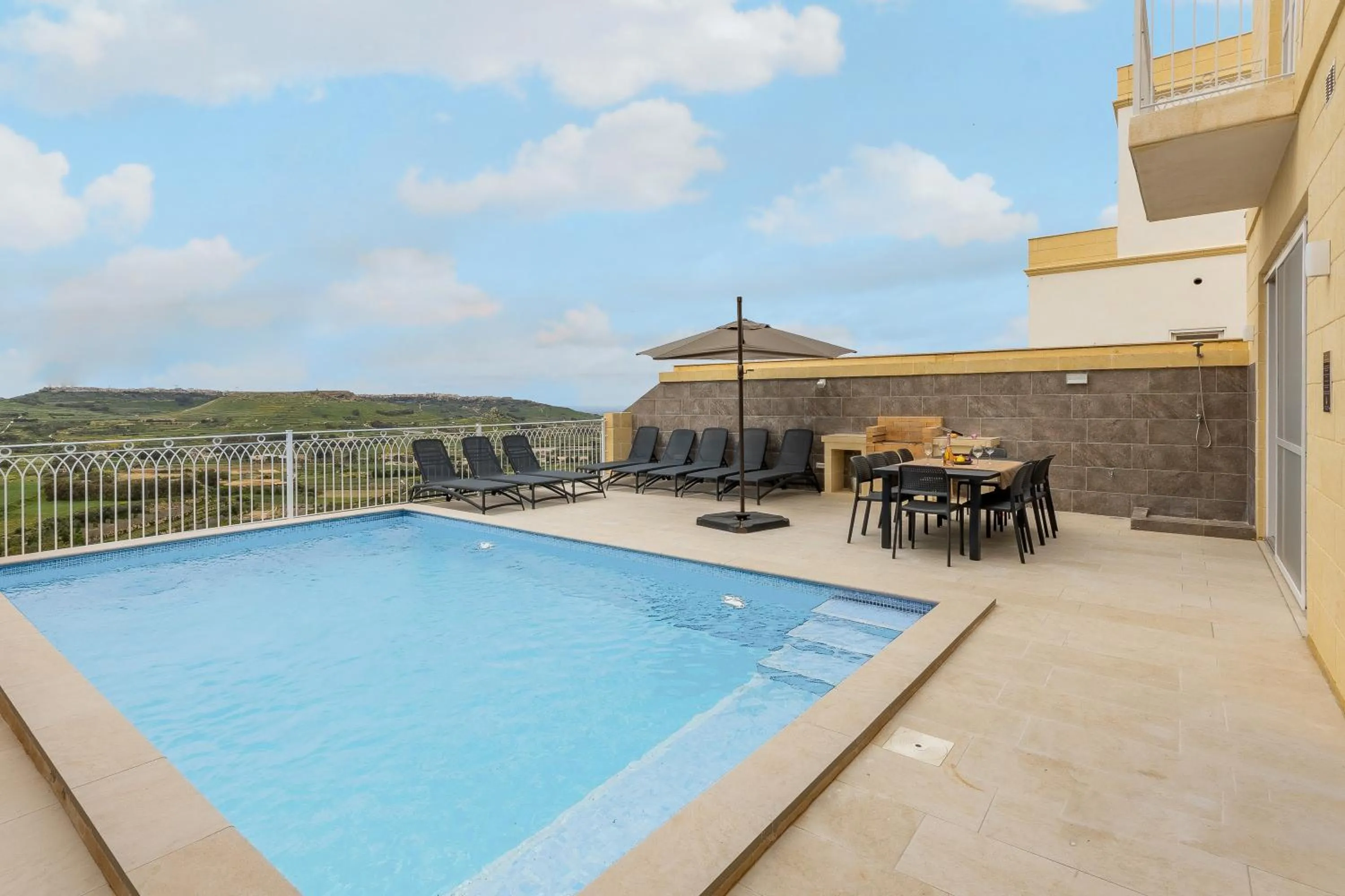 Pool view in Magnifica Gozitan Villa Pool And Jacuzzi - Happy Rentals